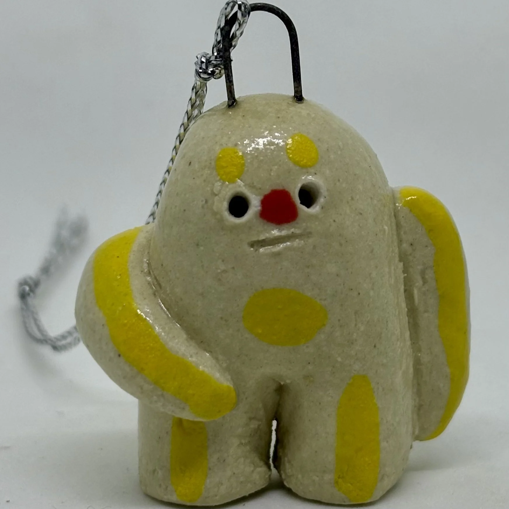 Shortie - Round-head with big arms and yellow stripes