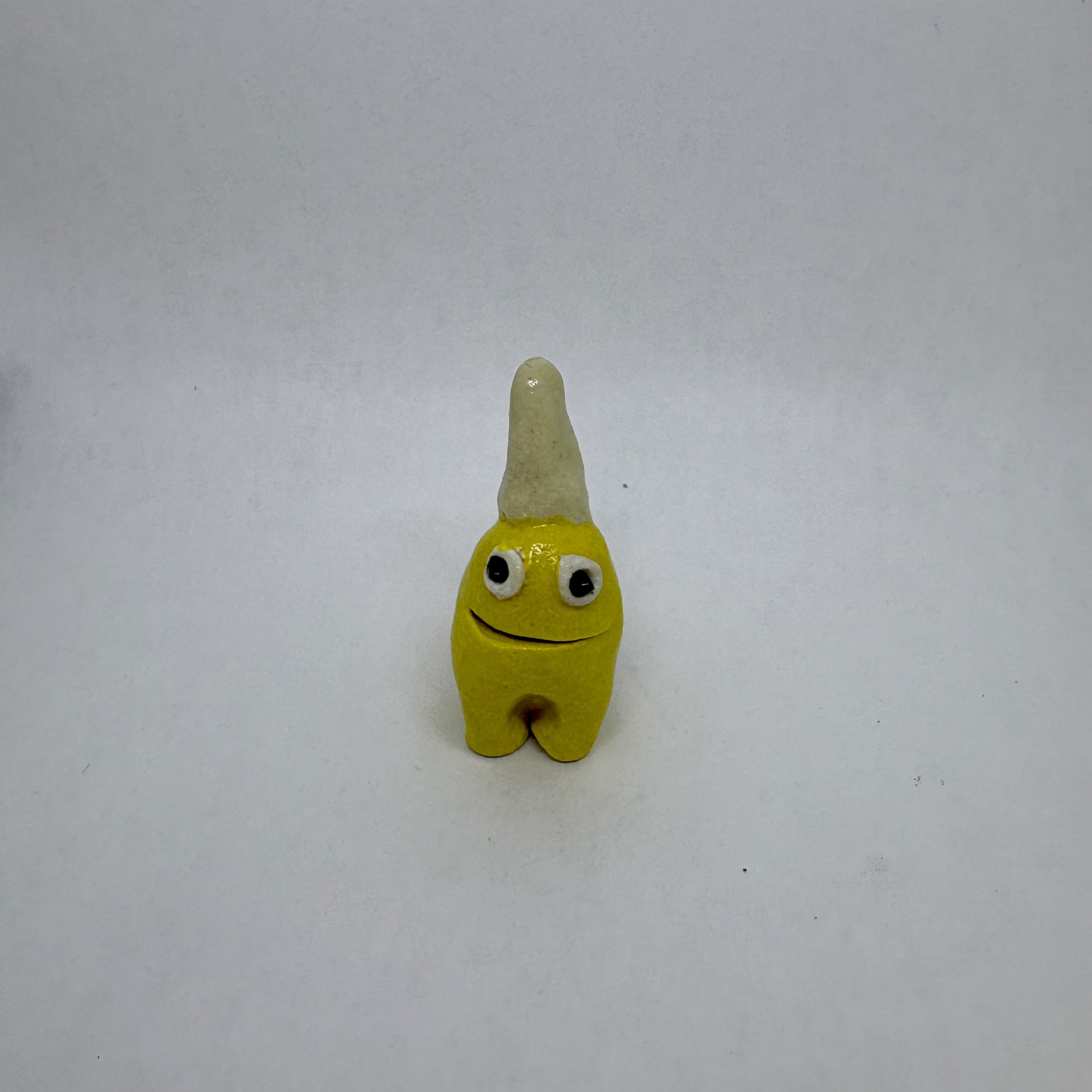 Tiny monster - yellow with white horn