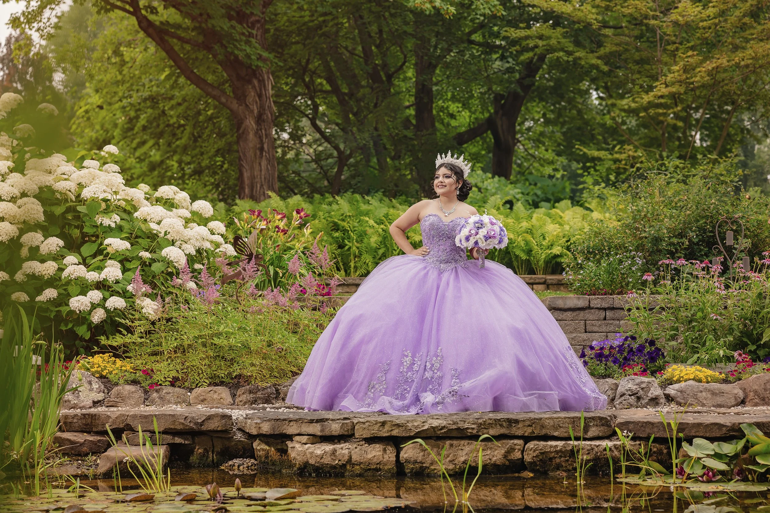 Outdoor garden quinceañera photoshoot with purple gown and flowers – natural light Sweet 15 photography Indianapolis