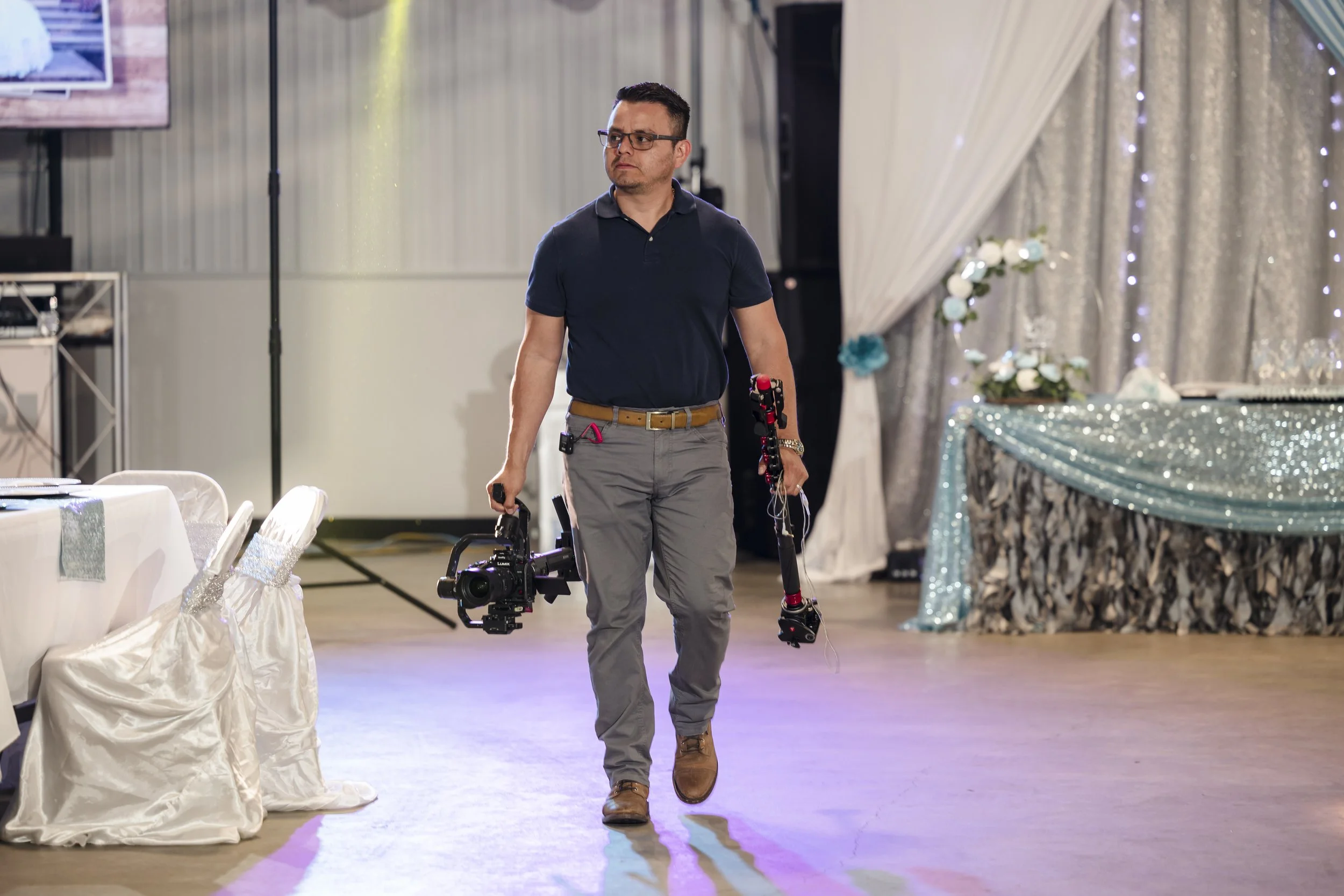 Wedding videographer filming reception details in Indianapolis, Indiana – Eli Mestas.