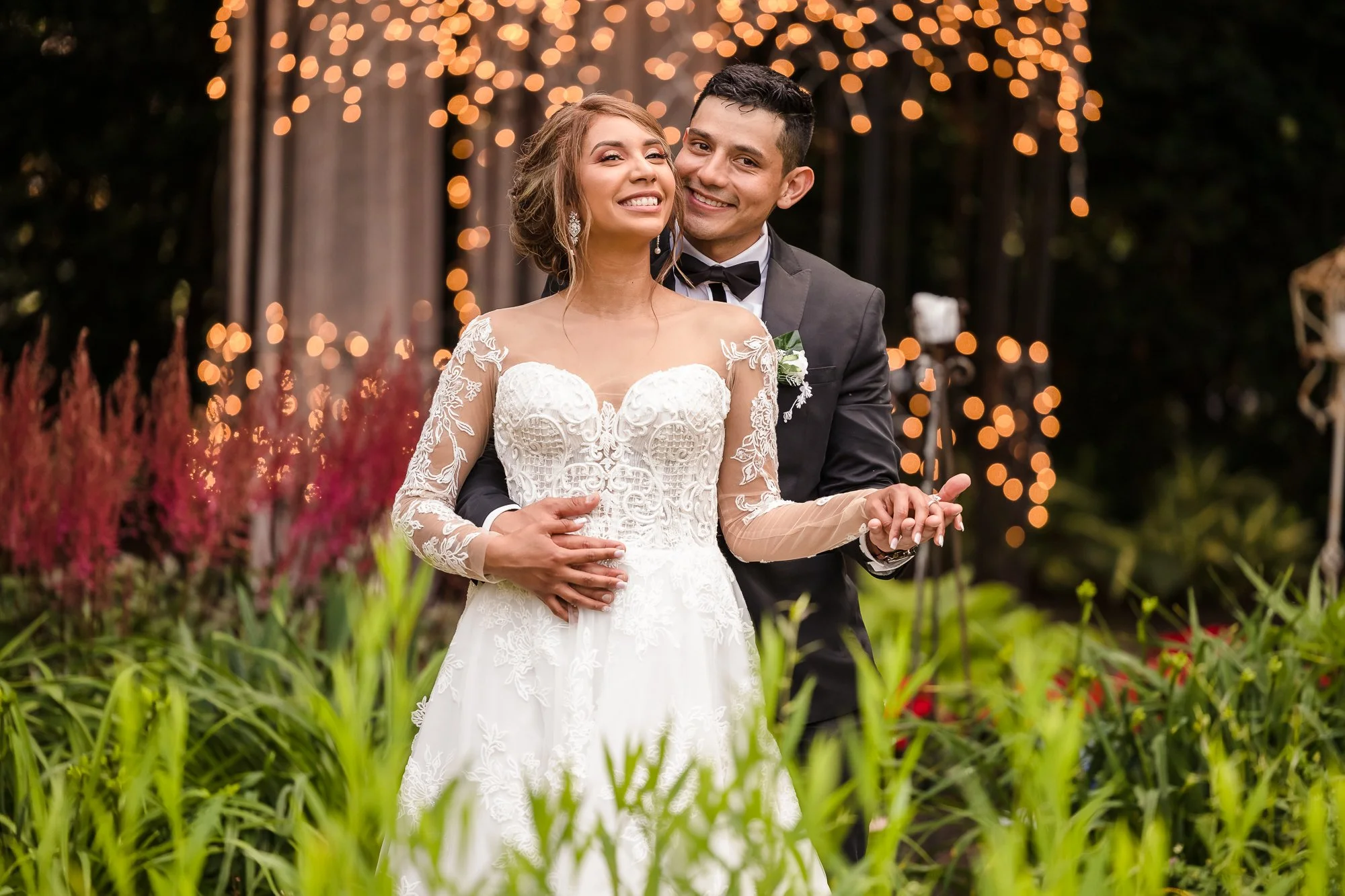 Romantic first dance under string lights at outdoor wedding reception – cinematic wedding photography and video by Eli Mestas Indianapolis