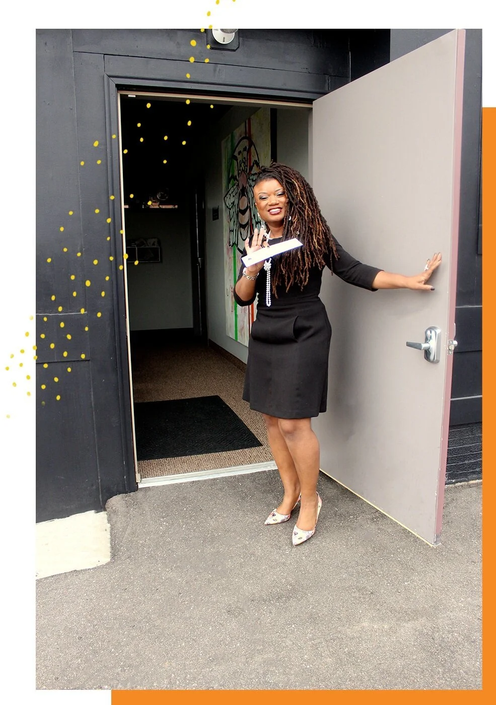 Dr. Sheila Sweeney smiling and waving