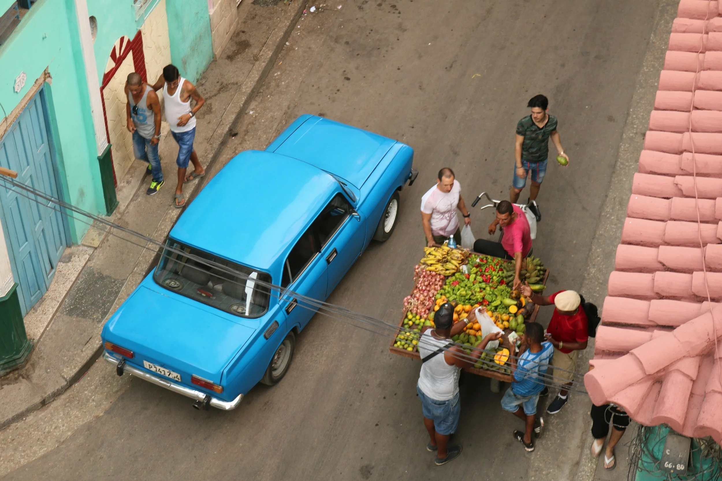 Cuban independent private sector worker selling fruits and vegetables on a street in Havana.