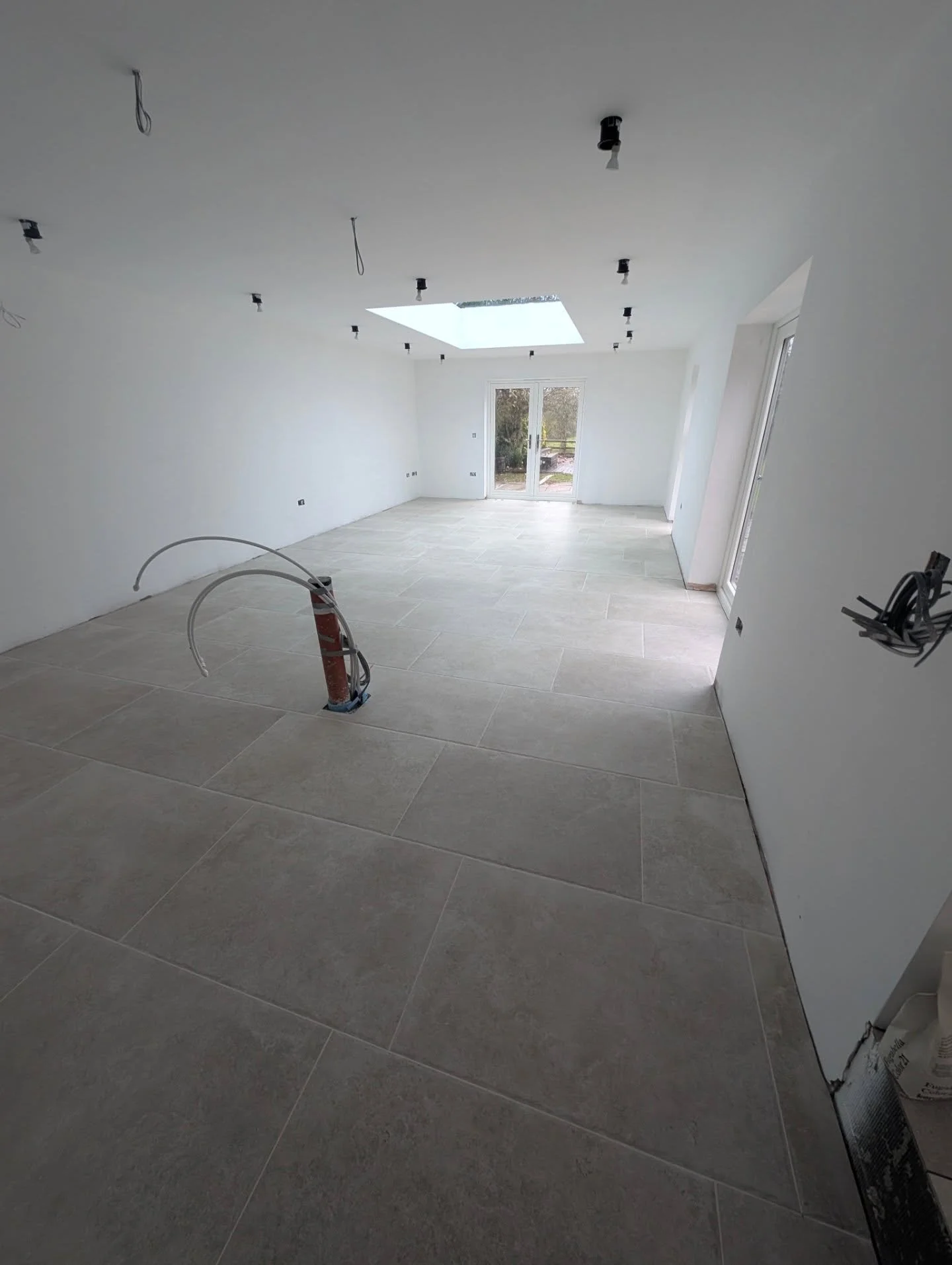 One of the final jobs of the year, this multi room floor with a nice stone look porcelain tile, prepared with @schlutersystemsuk dirtra 25 and @kelmore_ltd adhesives. Some work went into this one with the help of Pete, sharing the back ache. 

#sheff