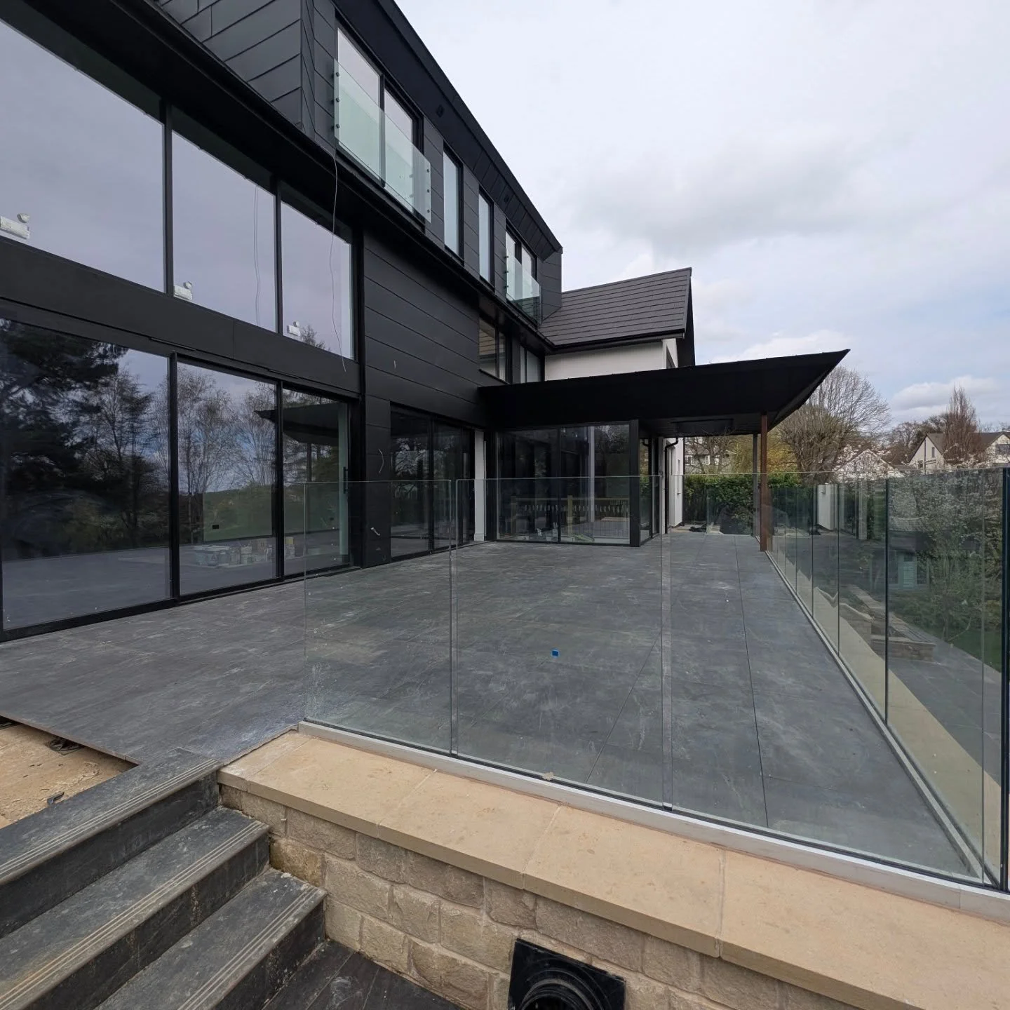 Finished this week, this lovely balcony using 900x600 20mm porcelain slabs on a pedestal system by @genesisglobalsystems for those that dont know, this is open joined and the water drains through the tile joint and away on the roof below.