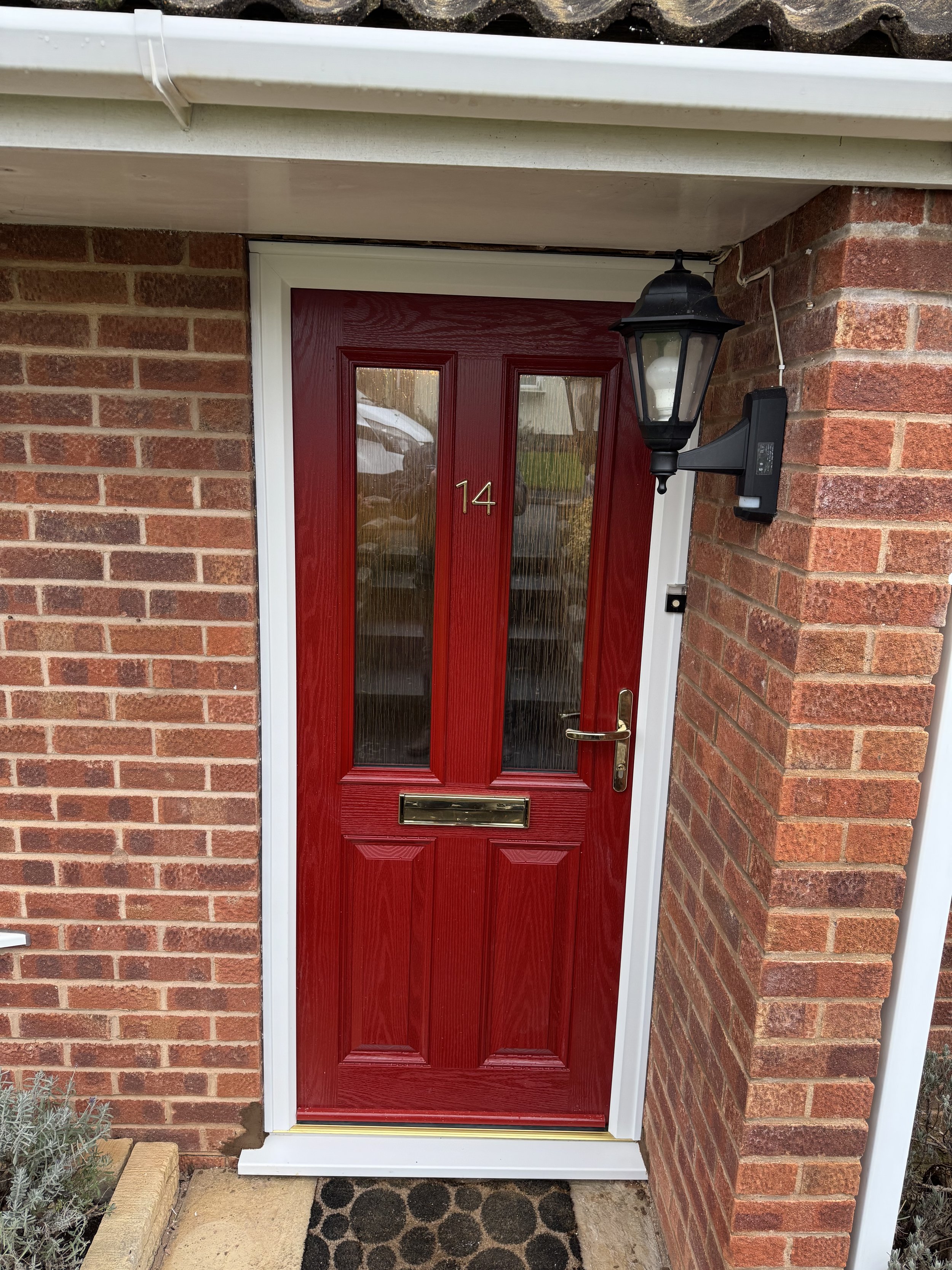 Red on red composite door in Exmouth