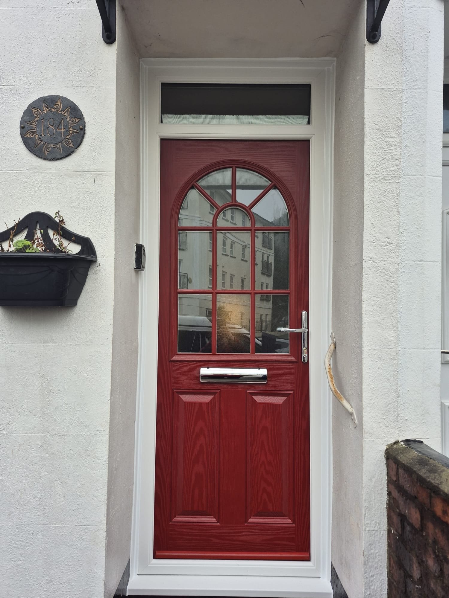 Red composite door in Torbay
