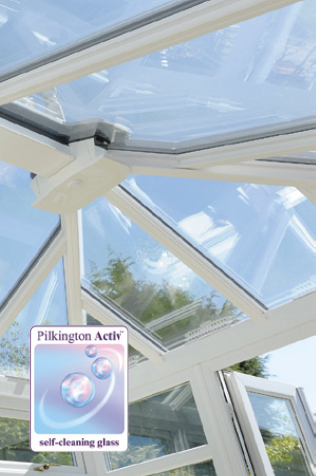 Close-up of a glass sunroom roof with a Pilkington Activ self-cleaning glass sticker.