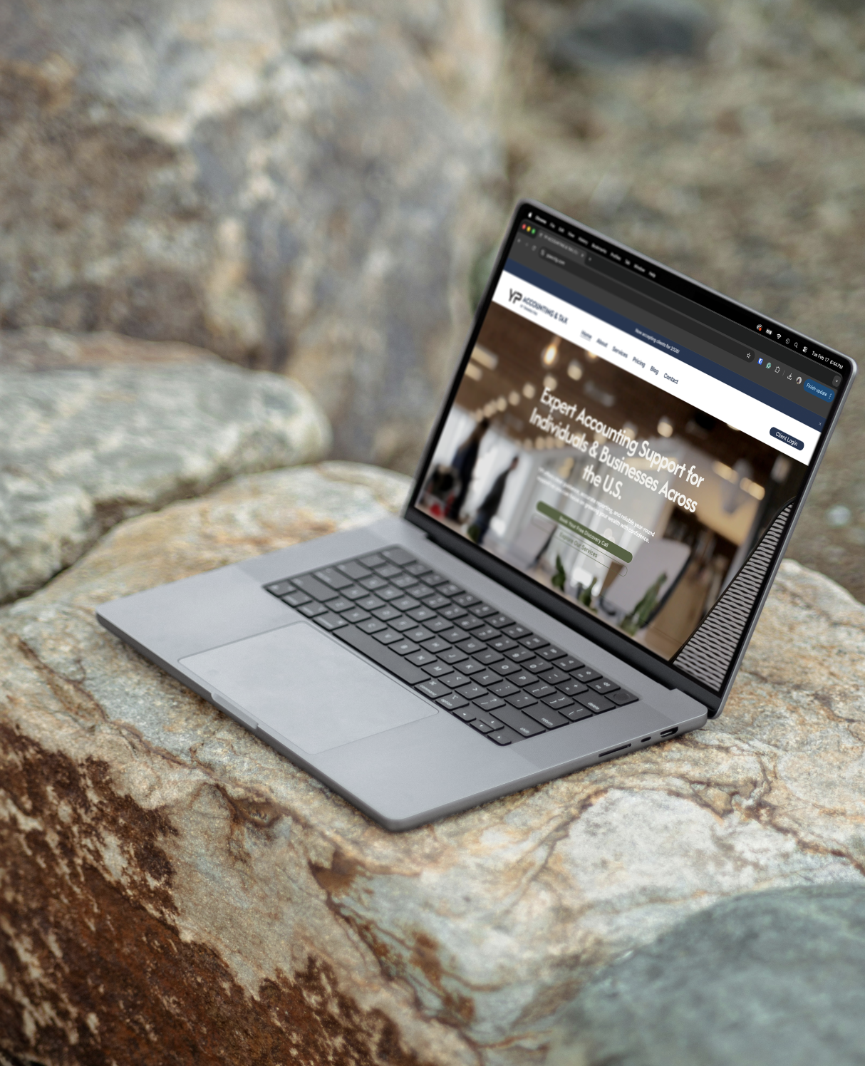 Yanarro Pak Accounting Website Design - Laptop on marble