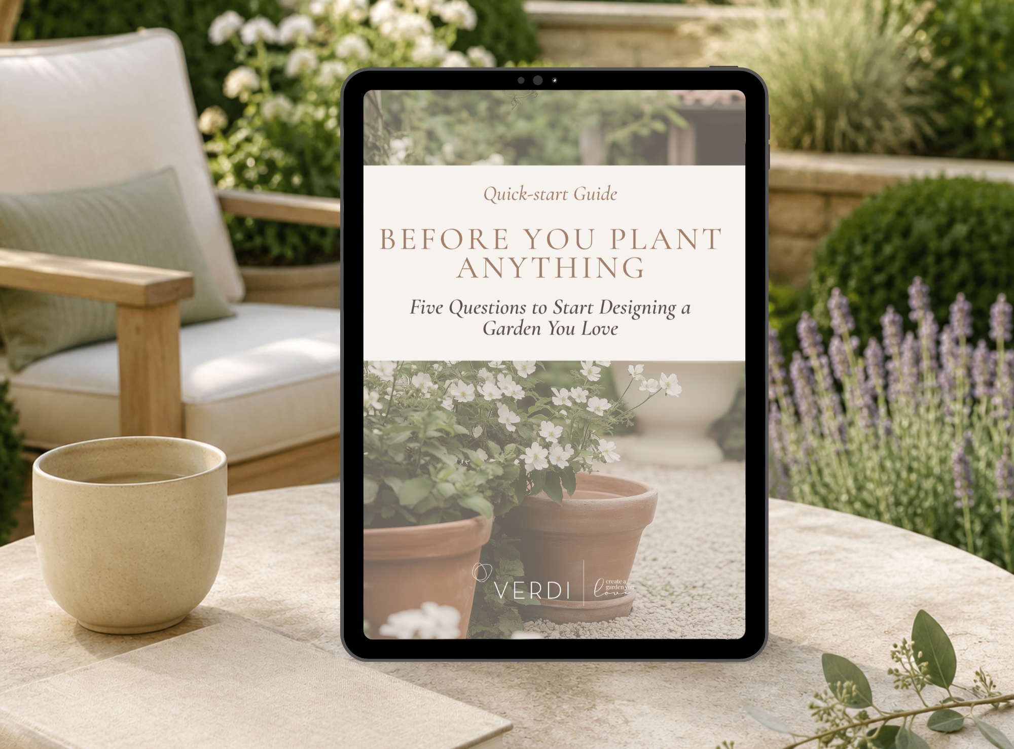 Before You Plant Anything garden-design Quick-Start Guide displayed on a tablet beside a notebook and flowers.