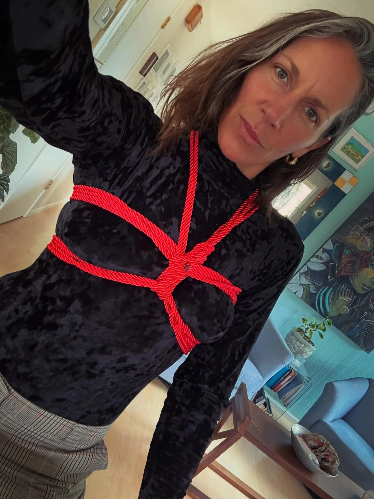 There are parts of me that are nervous to be seen.
And parts of me that know being seen is the path.

I guide people into their bodies&mdash;
into sensation, truth, and self-trust.

And I do the same for myself. 

My first self-tie.
Exploring rope as