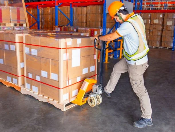 Cargo pallet with worker.jpg
