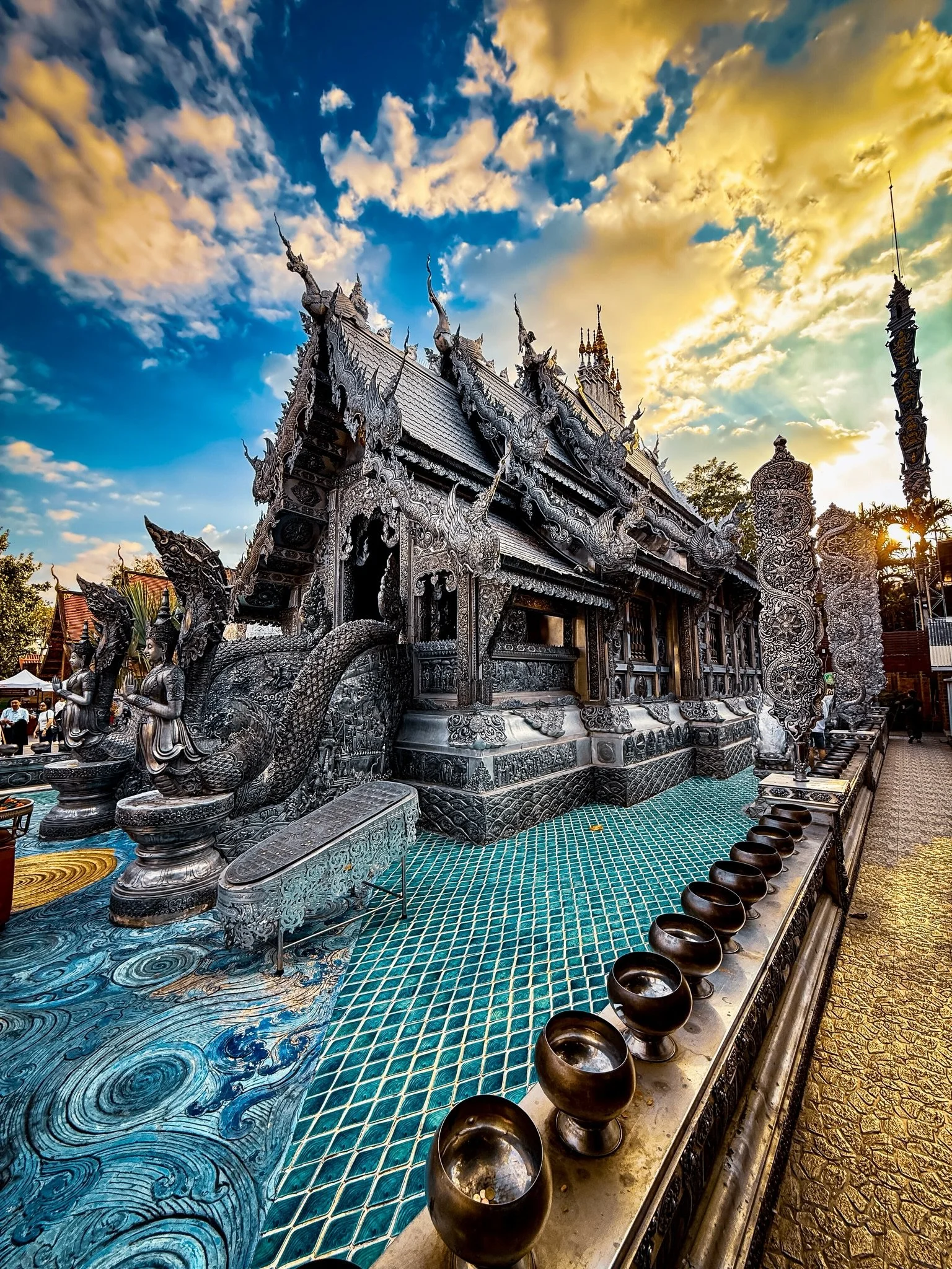 Wat Sri Suphan, the Silver Temple. This one was a surprise for us. We were on our way to our last temple of the day, but our driver Noom insisted we that we stop here first. It was definitely worth the time and we caught some great sunset light for o