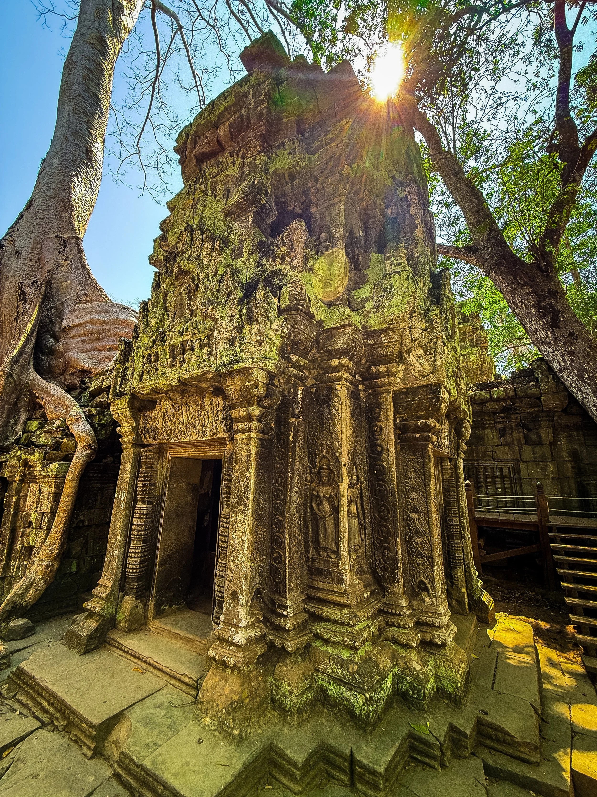 Ta Prohm, the &ldquo;Tomb Raider Temple&rdquo;. Made even more famous as a filming location for the 2001 Tomb Raider movie, this was probably our favourite Cambodian temple. The giant tree roots wrapped around the ruins give the entire place a very c