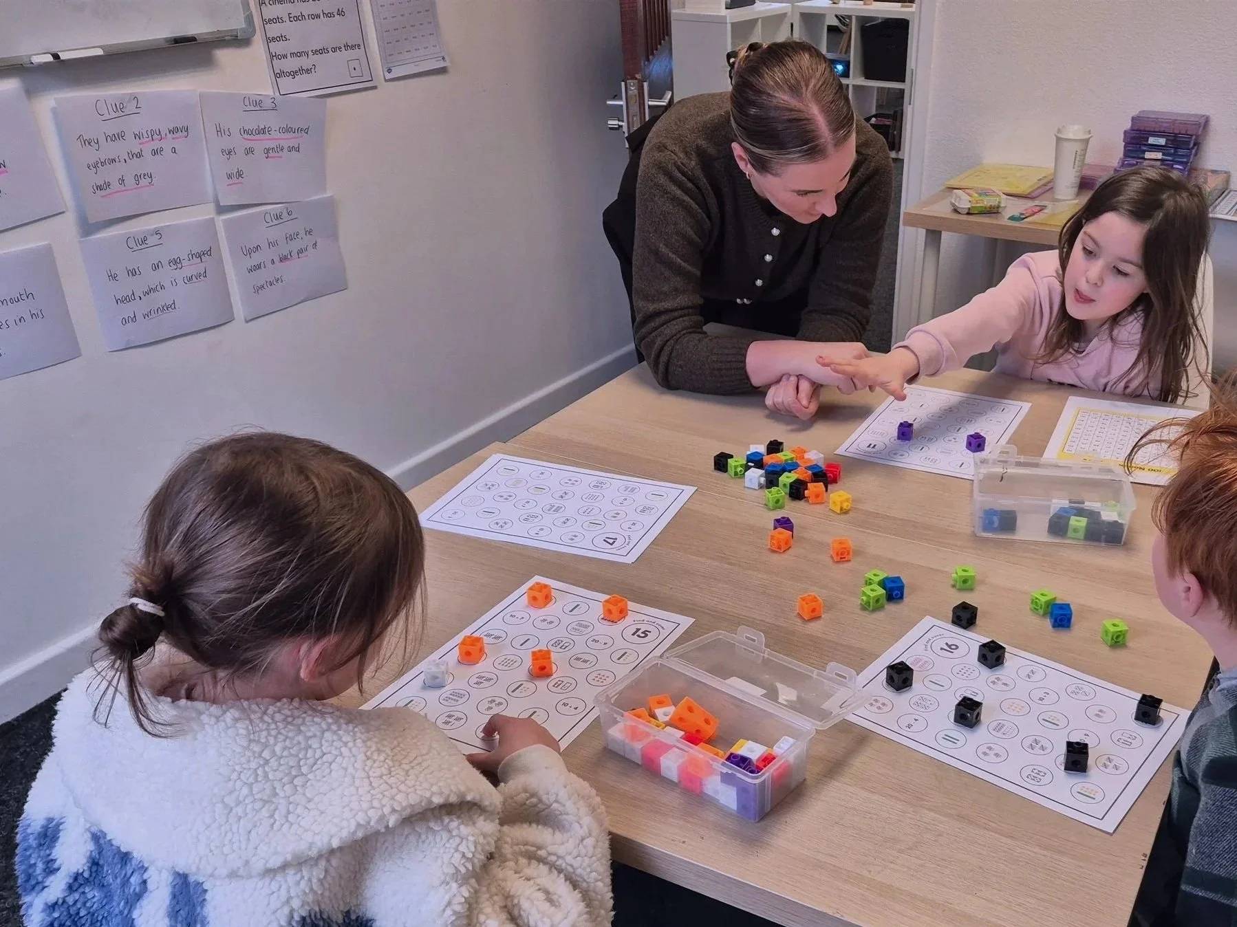 Sophie Hughes from Study Space Academy tutoring at a desk in Wirral