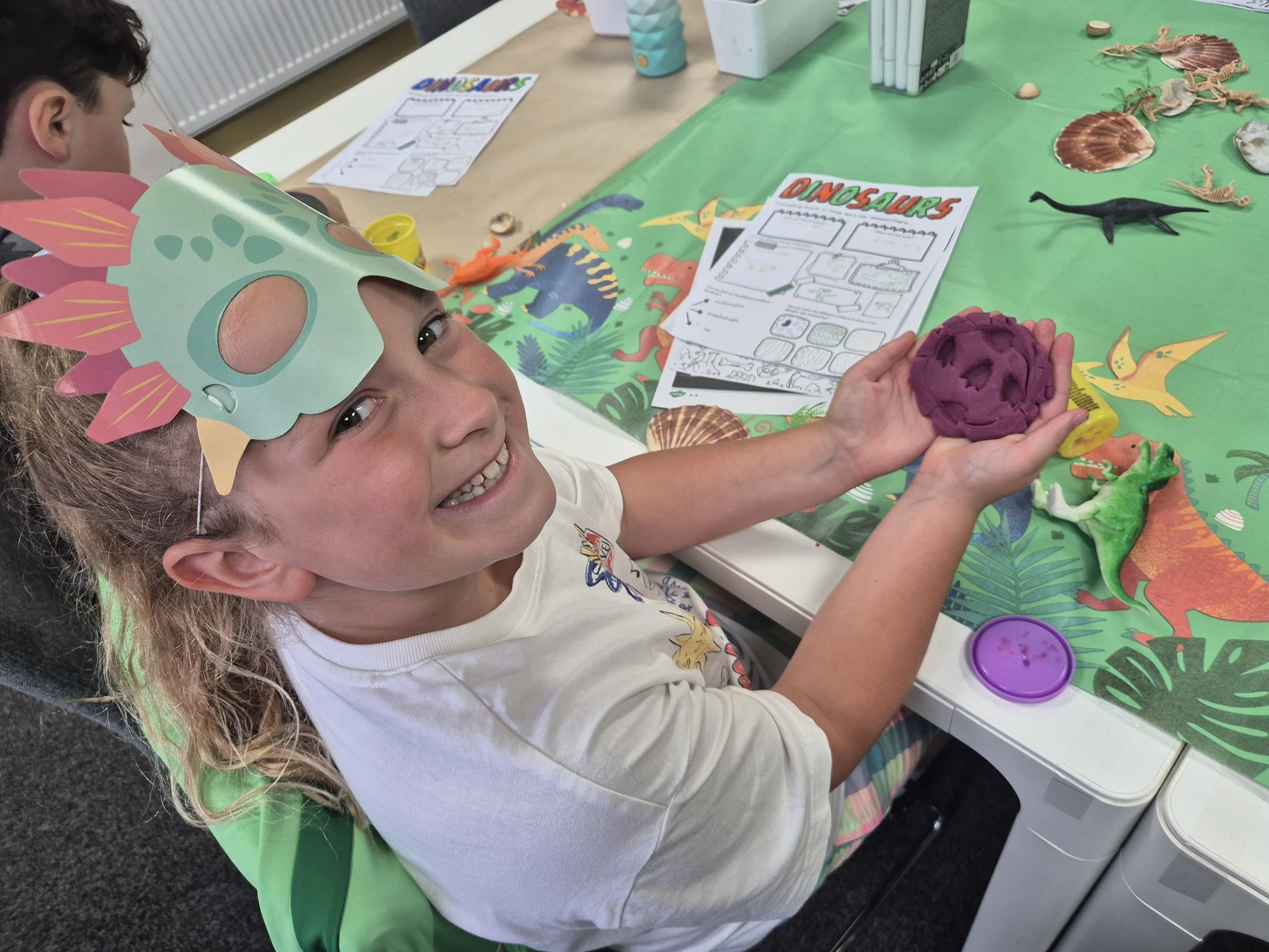 Child exploring sensory play with playdough during an Alternative Provision session