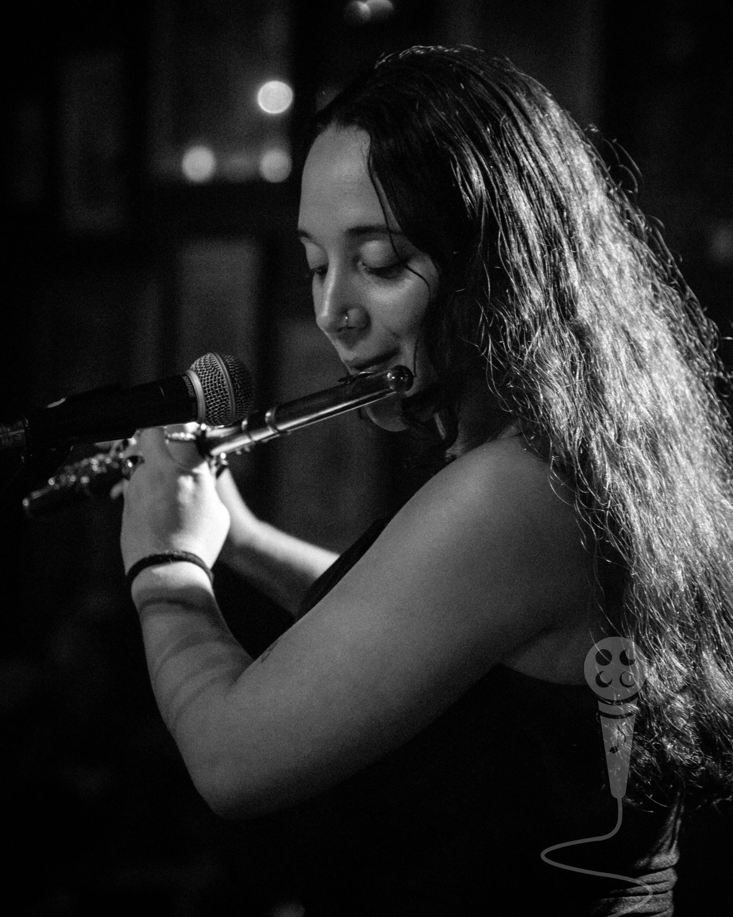 A woman playing a flute