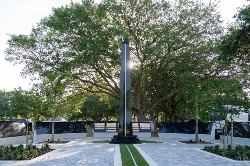 Veterans memorial and shaded trees at Sacrifice Park in Palm Bay, Florida