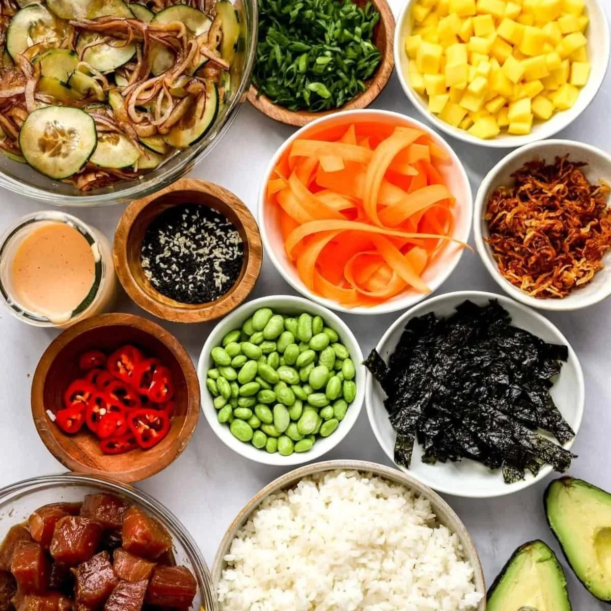 All our toppings for poke bowls. Avocado, guacamole, mango salsa and veggies