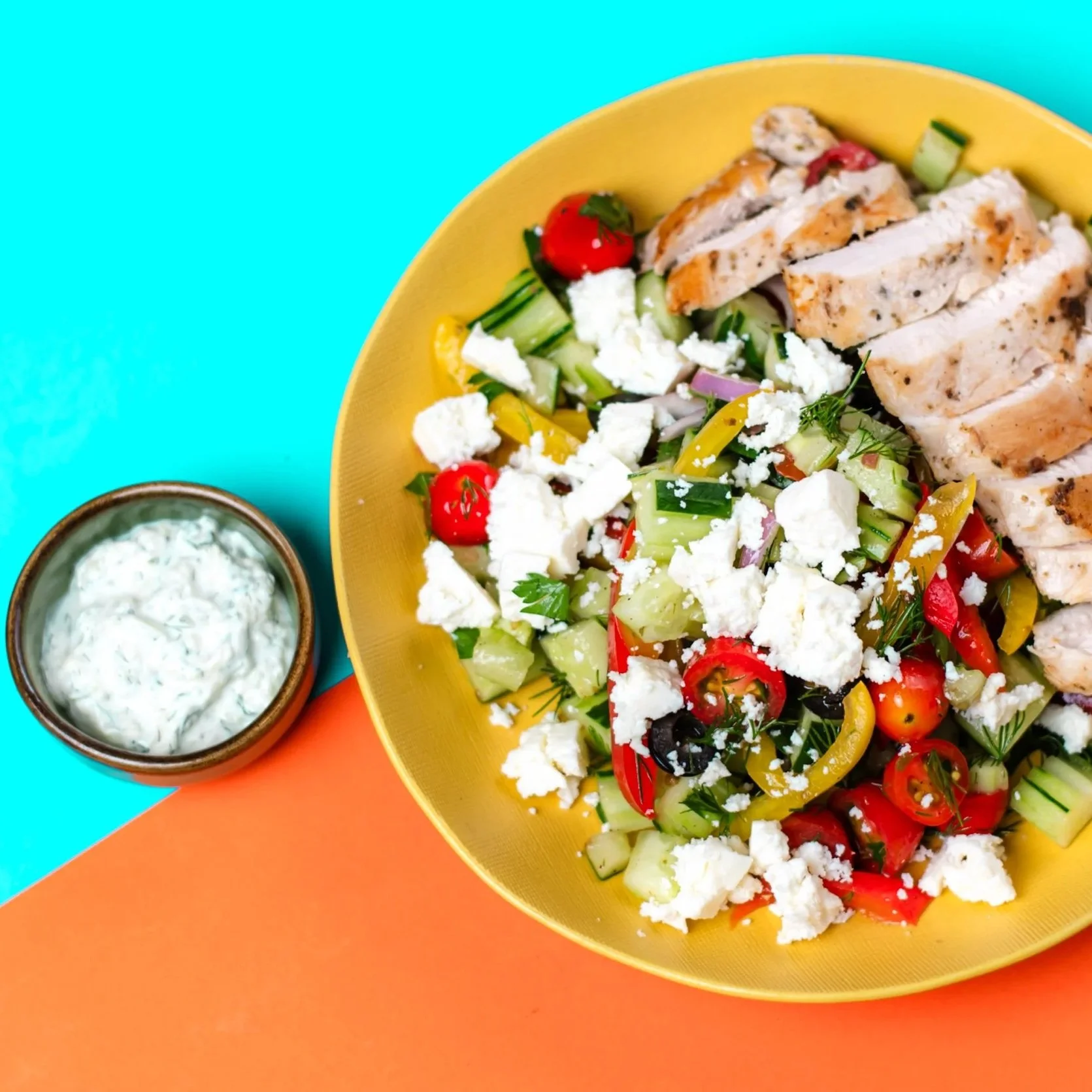best Greek salad with chicken by the bowl spot. Housemade tzatziki as greek restaurant original recipe