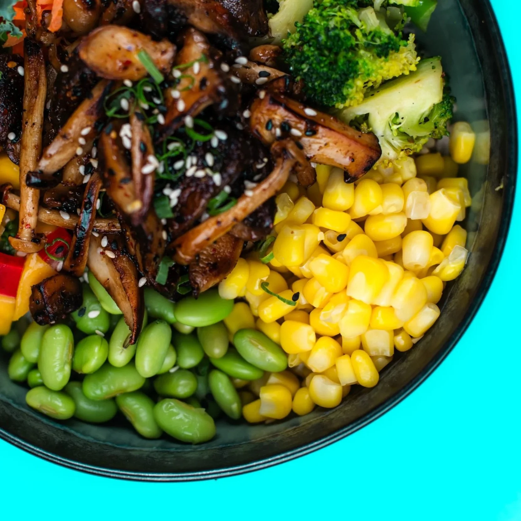 Plant-based mushroom poke, with edamame, mango salsa and corn