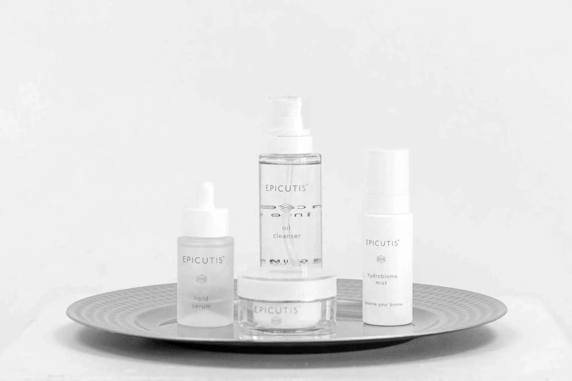 Epicutis luxury skincare products including lipid serum, oil cleanser, and hydrating mist, used at Twin B Beauty Co in Canyon Texas to support skin barrier repair, reduce inflammation, and improve hydration for sensitive, acne-prone, and aging skin.