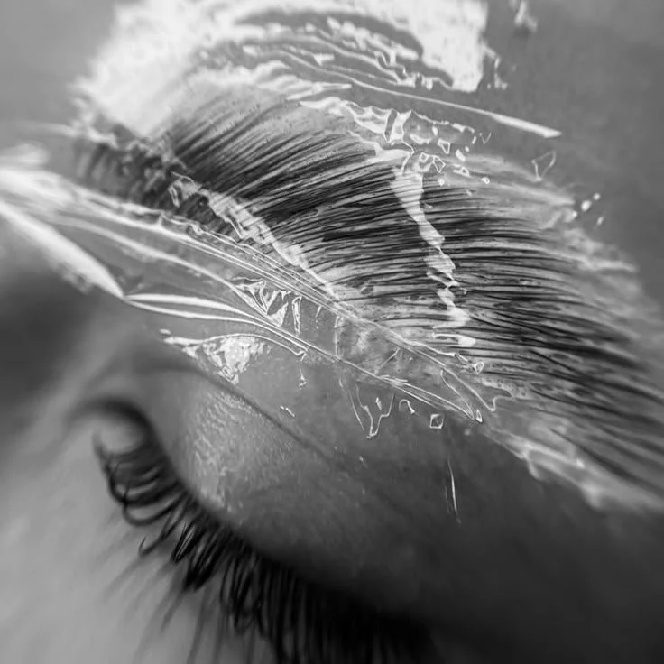 Close-up of brow lamination service at Twin B Beauty Co in Canyon Texas, showcasing eyebrow shaping, lifting, and setting technique designed to create fuller, defined brows as part of professional brow services and beauty treatments.