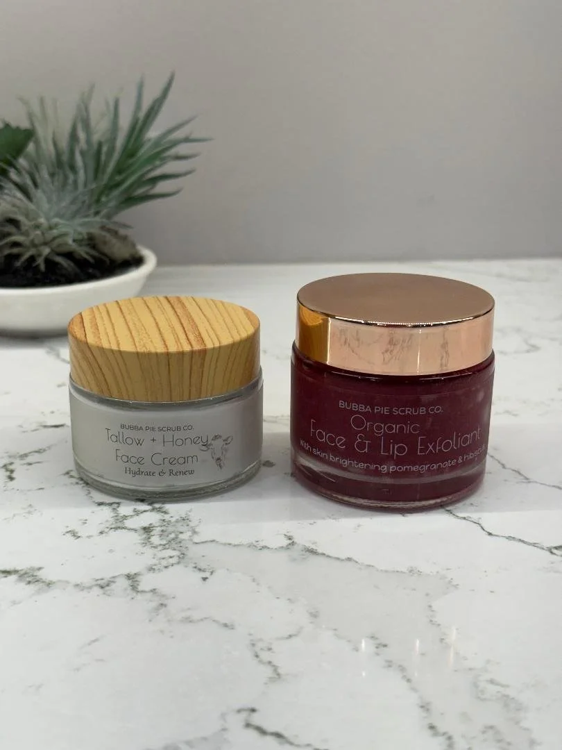 Person holding a speckled, possibly cookie or crumble-like snack over an open jar labeled 'Bubble Pie Scoop Coffee Bake'.