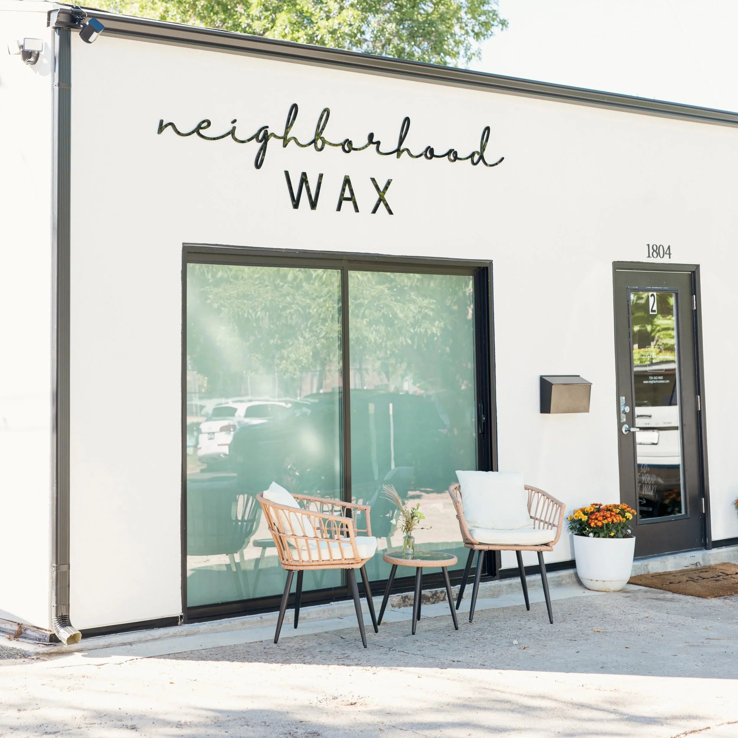 Neighborhood Wax storefront on South Pearl Street in Denver's Platt Park neighborhood.