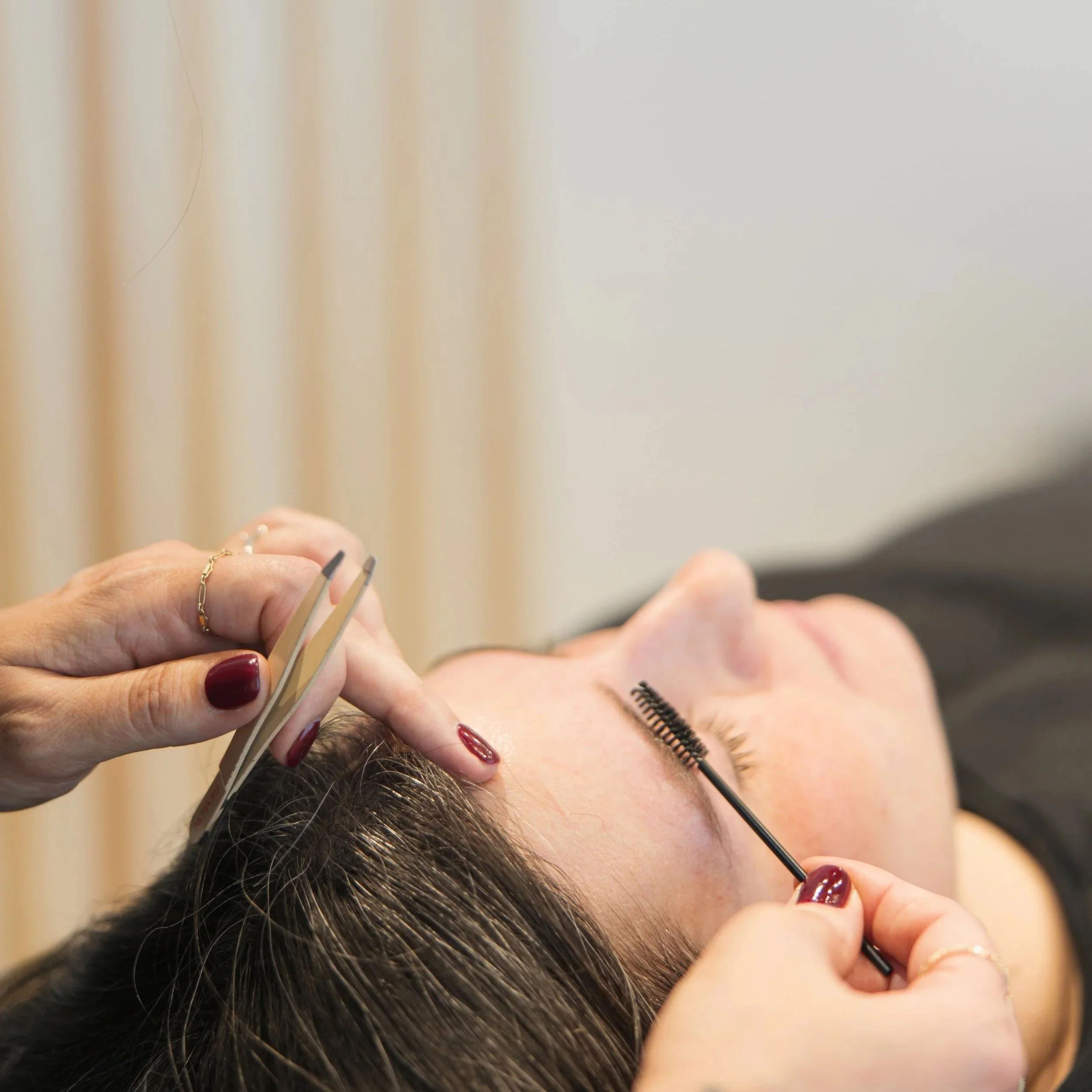 Professional eyebrow shaping and brow waxing service at Neighborhood Wax in Denver, Colorado