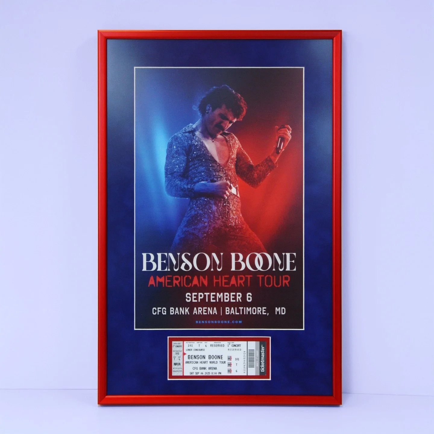 Whether you are celebrating your 100th show or your first show, you can make your concert ticket the best encore ever! 
Displayed in a striking red metal frame, with blue suede matting and non-glare glass. 

@bensonboone @cfgbankarena #customframing 