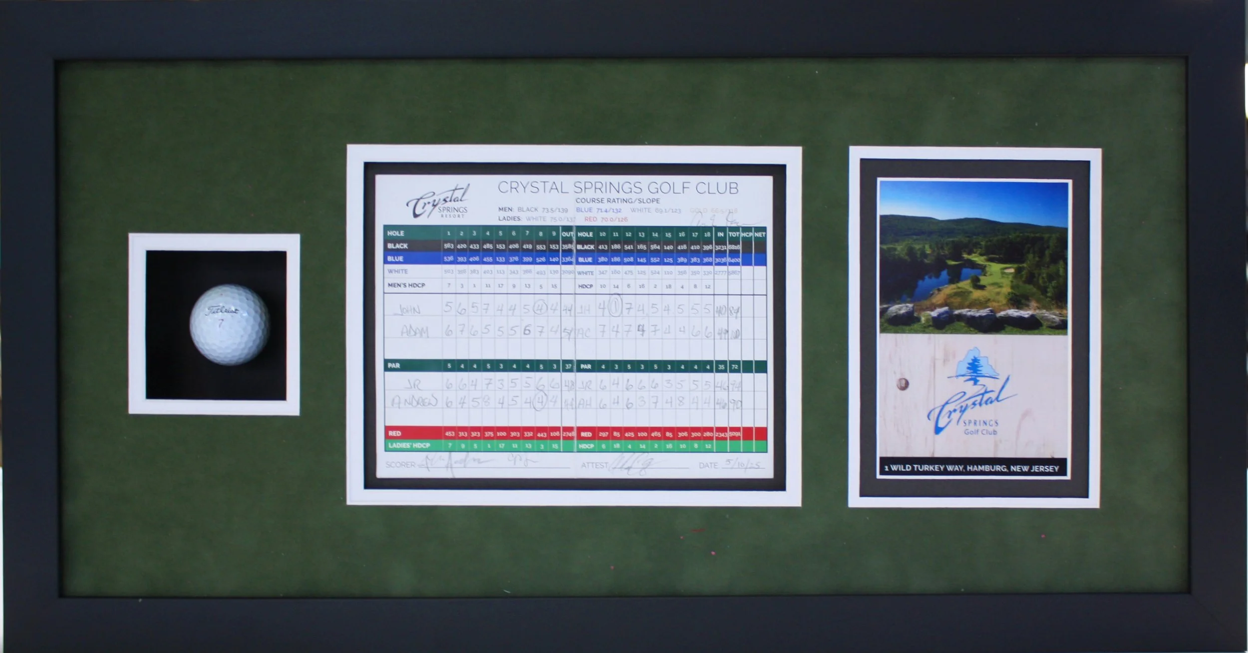 Custom framed display featuring a golf ball with the Titleist logo, a golf scorecard from Crystal Springs Golf Club, and a photo of the golf course with a lake and trees.