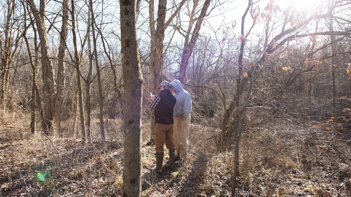 Land Specialist Ben Harshyne shows a hunting property in southeast Iowa.