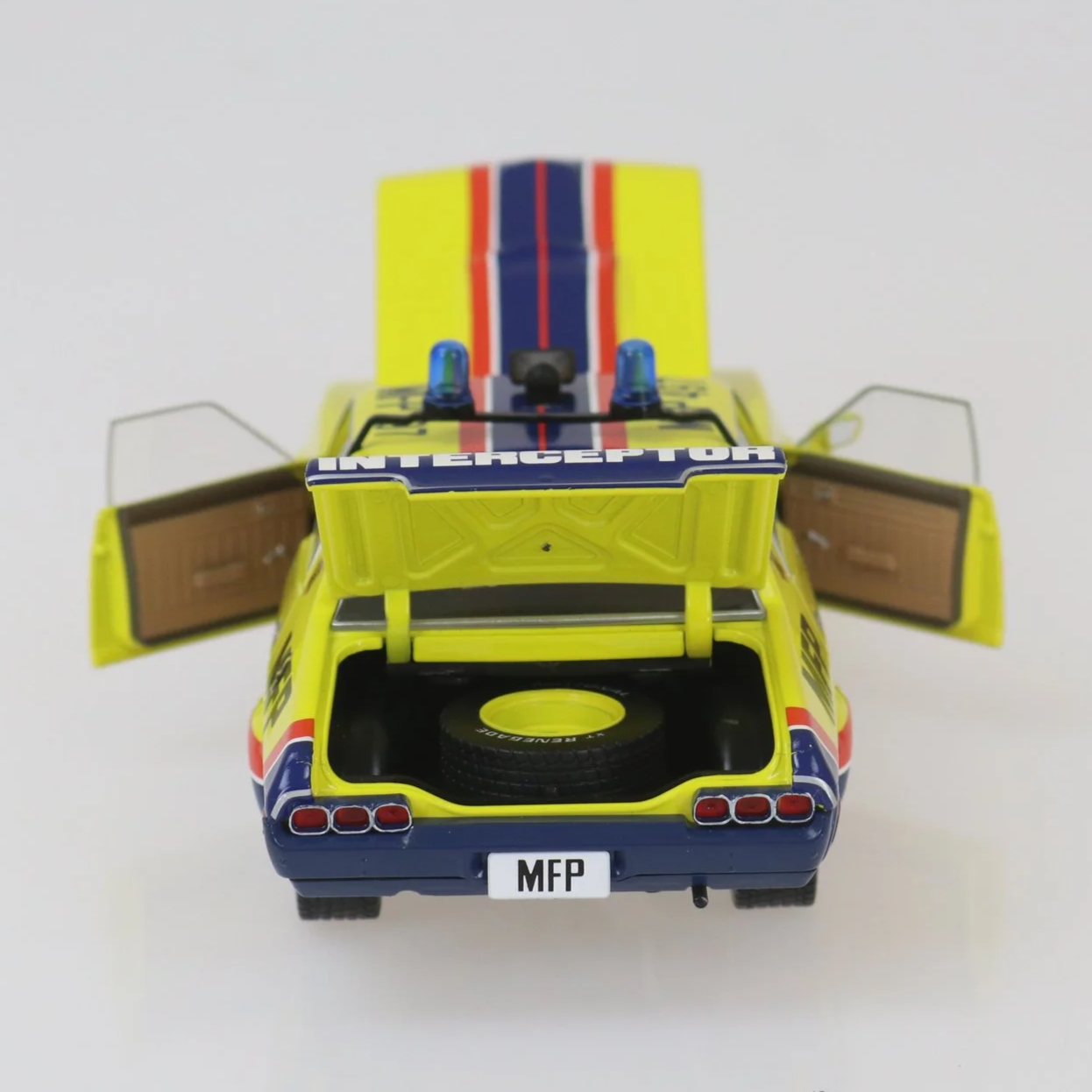 1:24 scale MFP March Hare XA Falcon movie replica – yellow and blue die-cast model with opening doors, bonnet, boot, and police lightbar