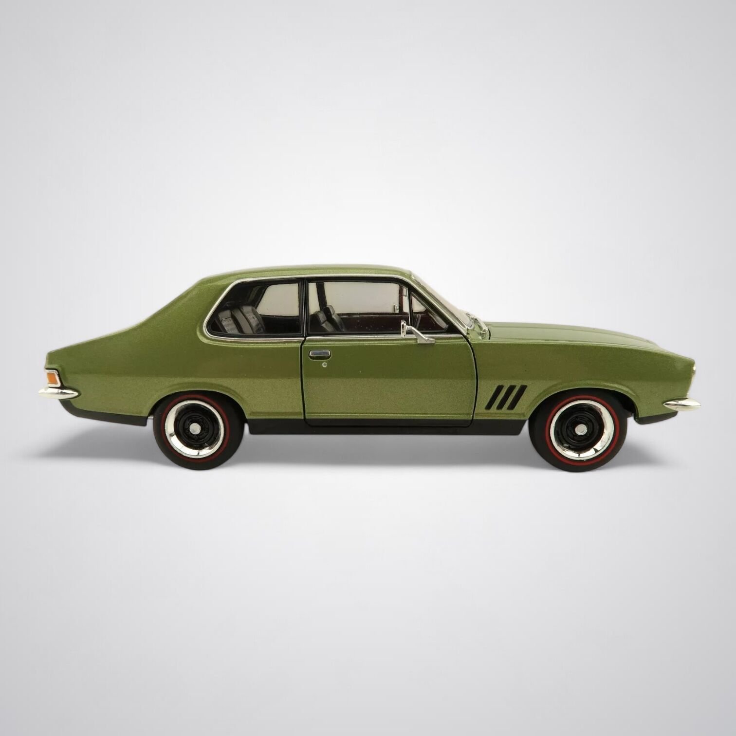 1:24 scale Holden LJ Torana 50th Anniversary Twin Set – green GTR and gold XU‑1 models with opening bonnet, doors and boot