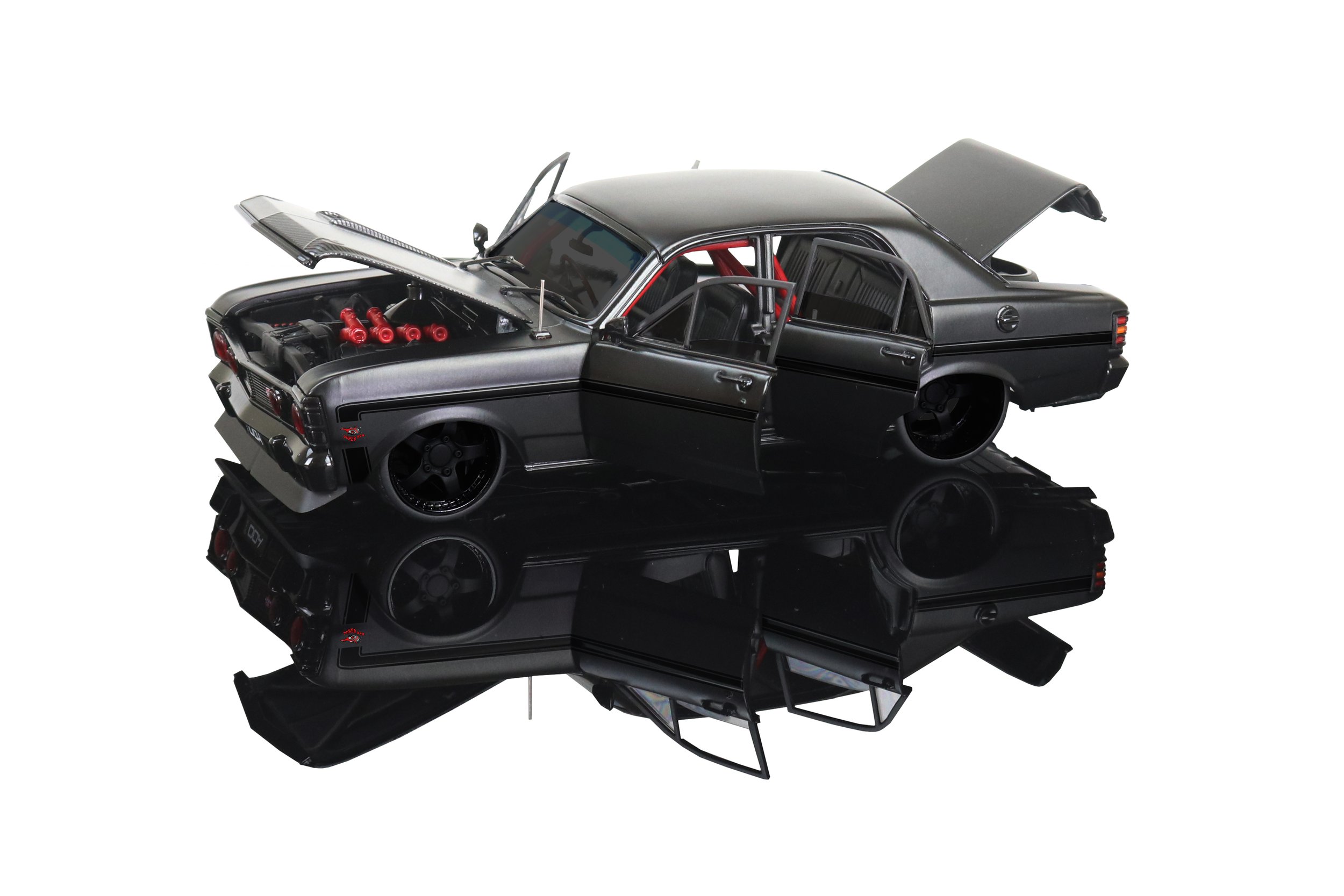 Limited-edition 1:24 scale DDA Ford Falcon XW 1969 “Inferno” die-cast model – matte black, carbon-look bonnet, red headlights, window-box packaging.