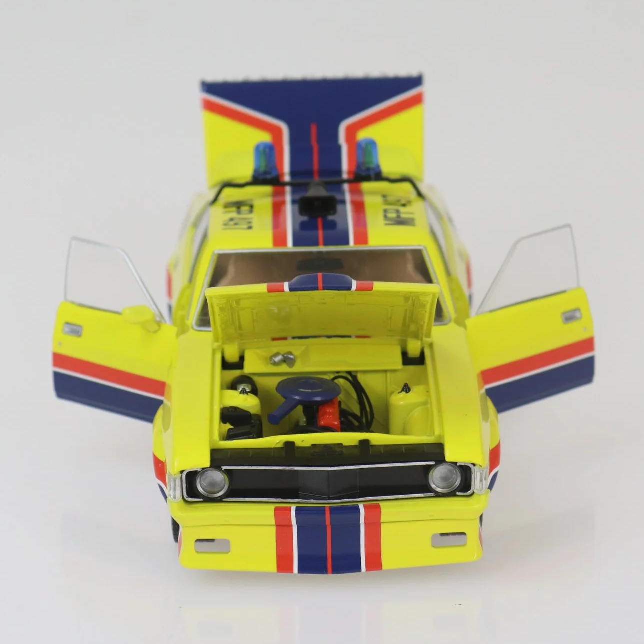 1:24 scale MFP March Hare XA Falcon movie replica – yellow and blue die-cast model with opening doors, bonnet, boot, and police lightbar