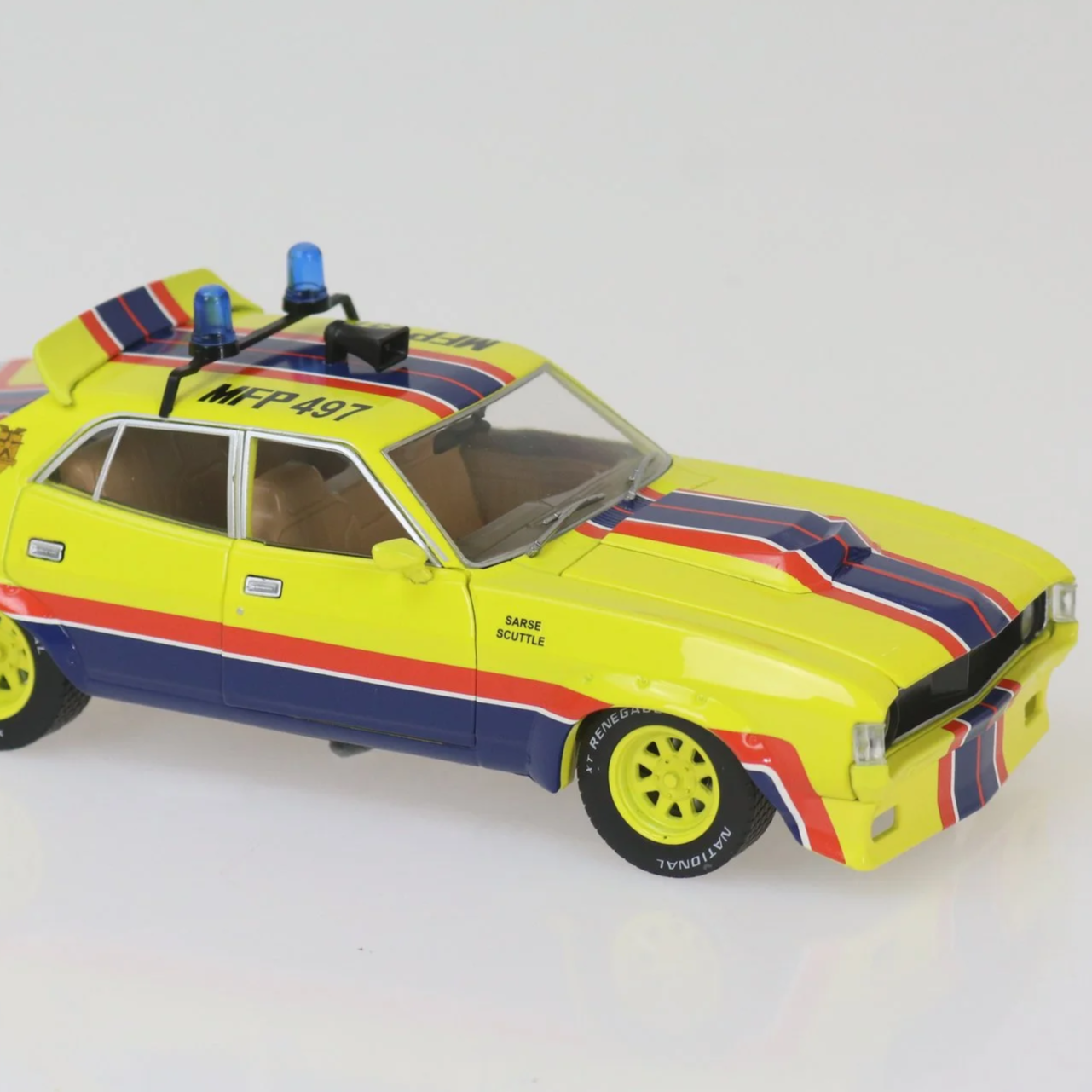 1:24 scale MFP March Hare XA Falcon movie replica – yellow and blue die-cast model with opening doors, bonnet, boot, and police lightbar