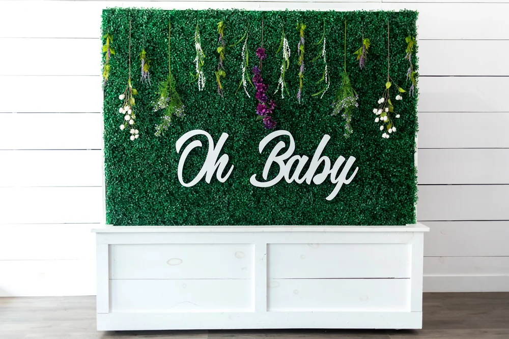 Styled event details — signs, florals and a dessert display