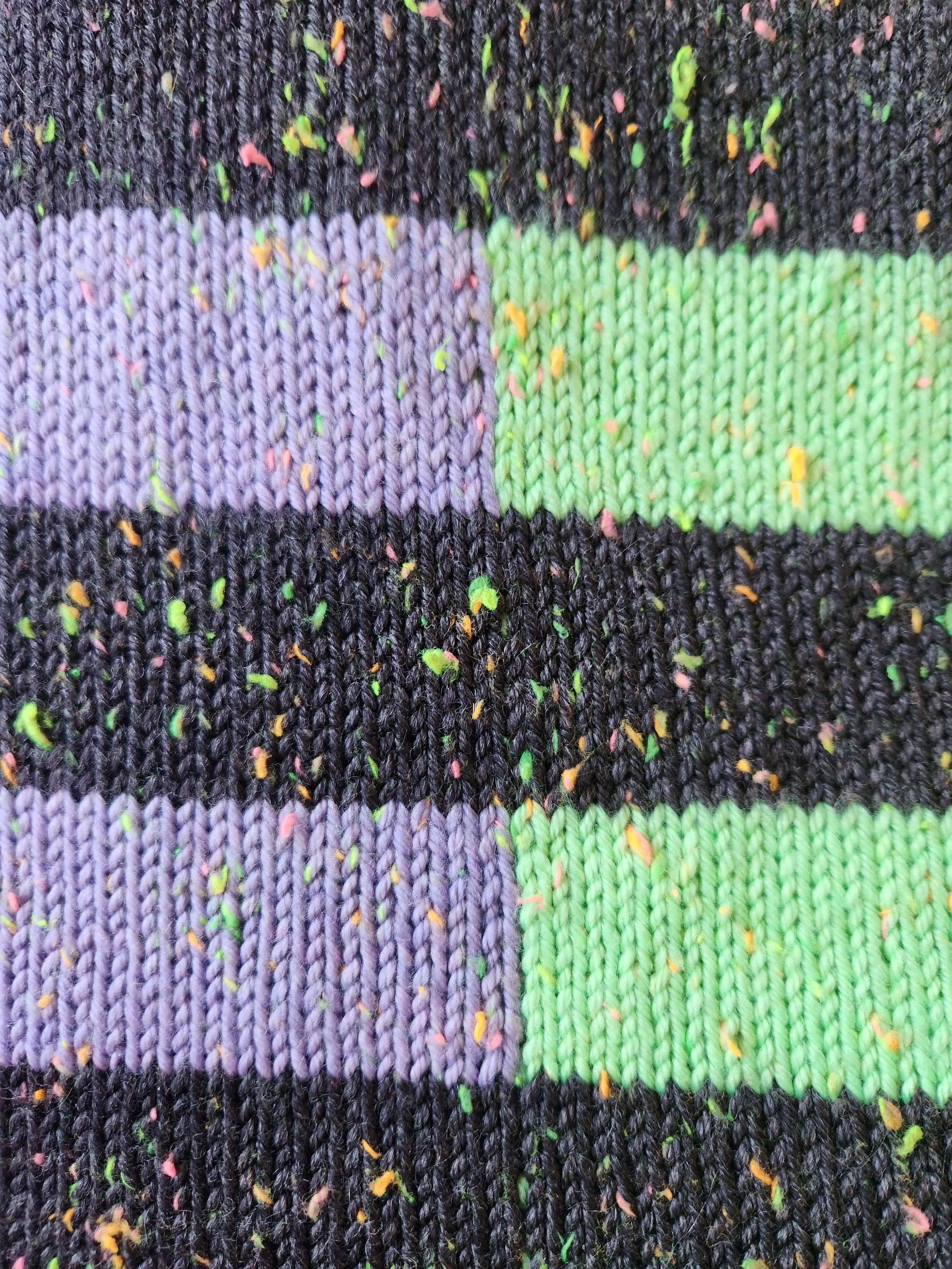 A closeup of a finished sweater