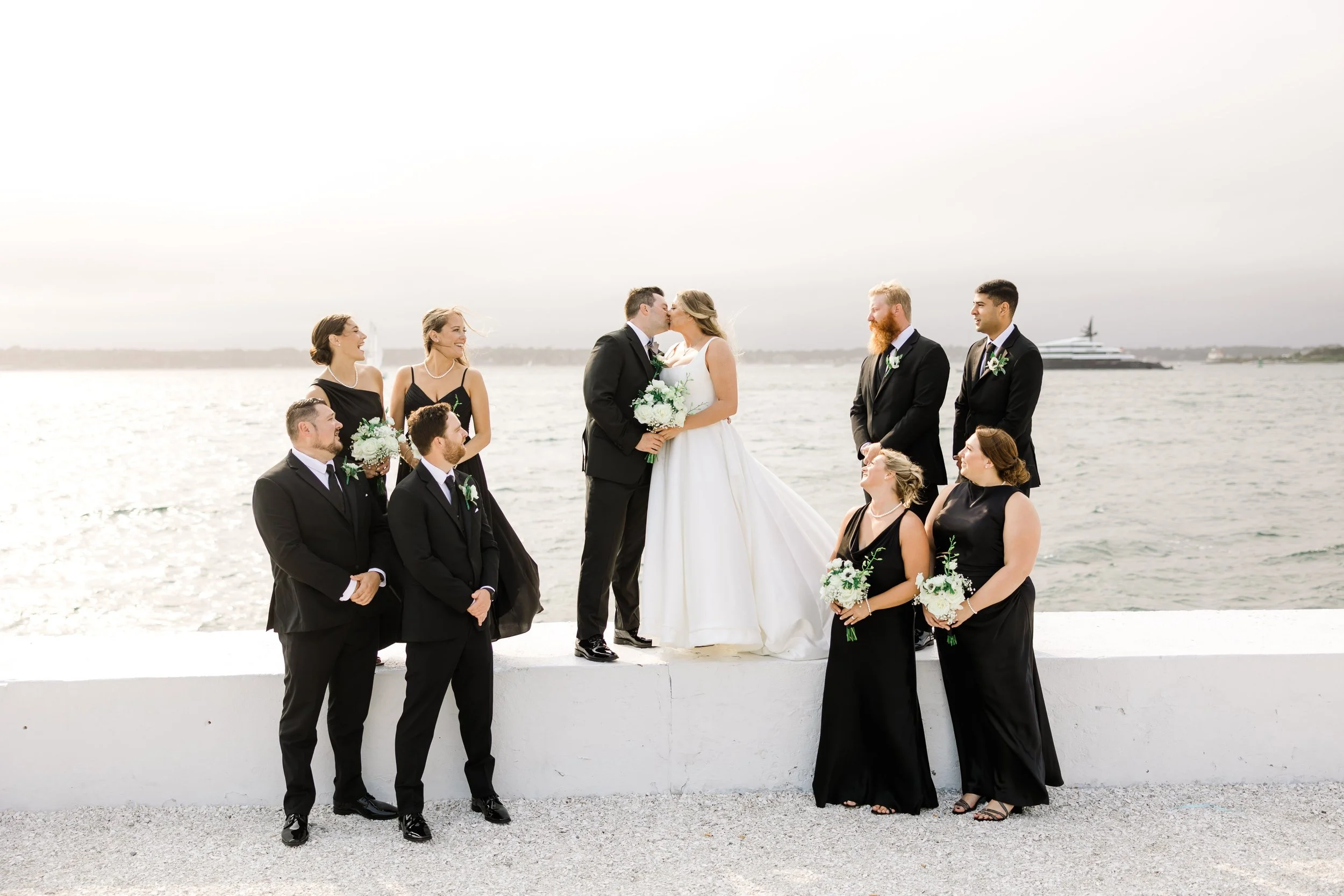 Jess and Wes Kiss with Party.jpg