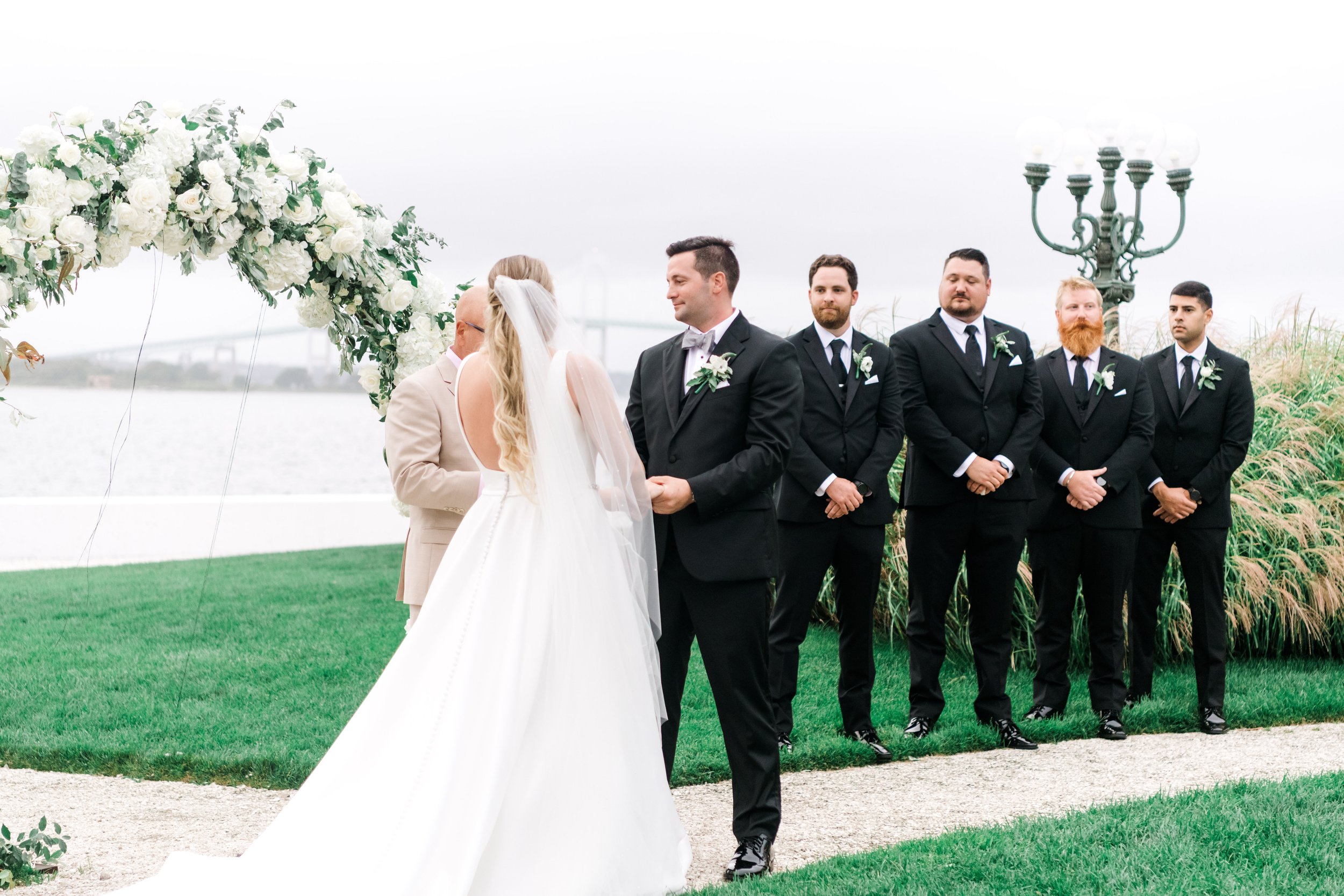 Wes and Jess Altar with Groomsen.jpg