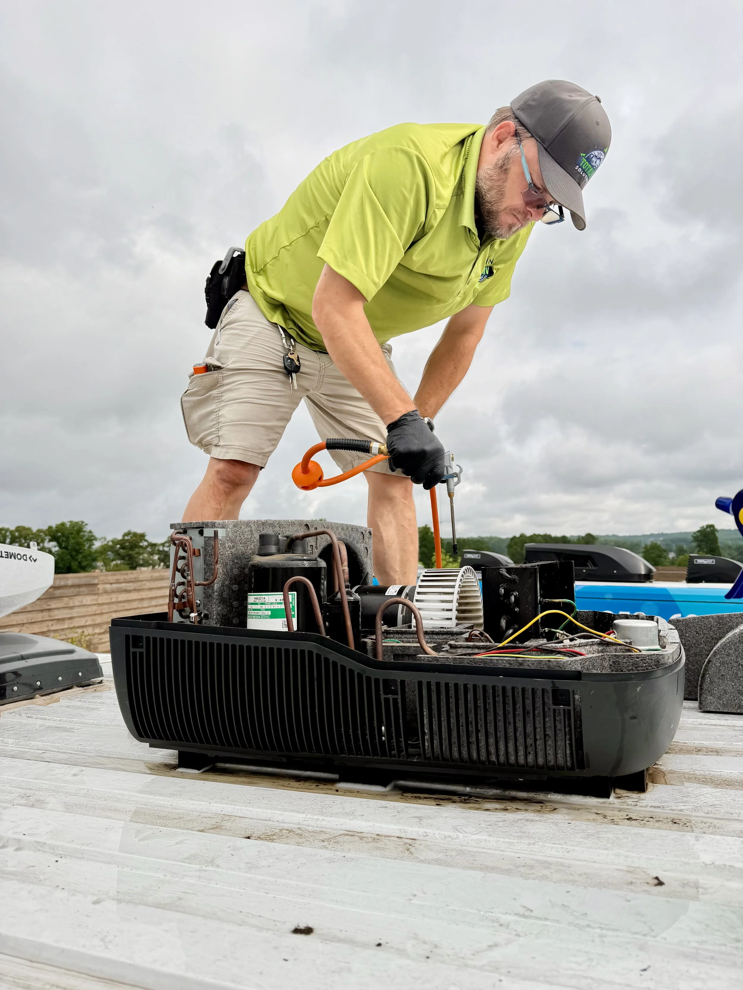 Jason performing mobile RV air conditioner maintenance in Canton, Georgia