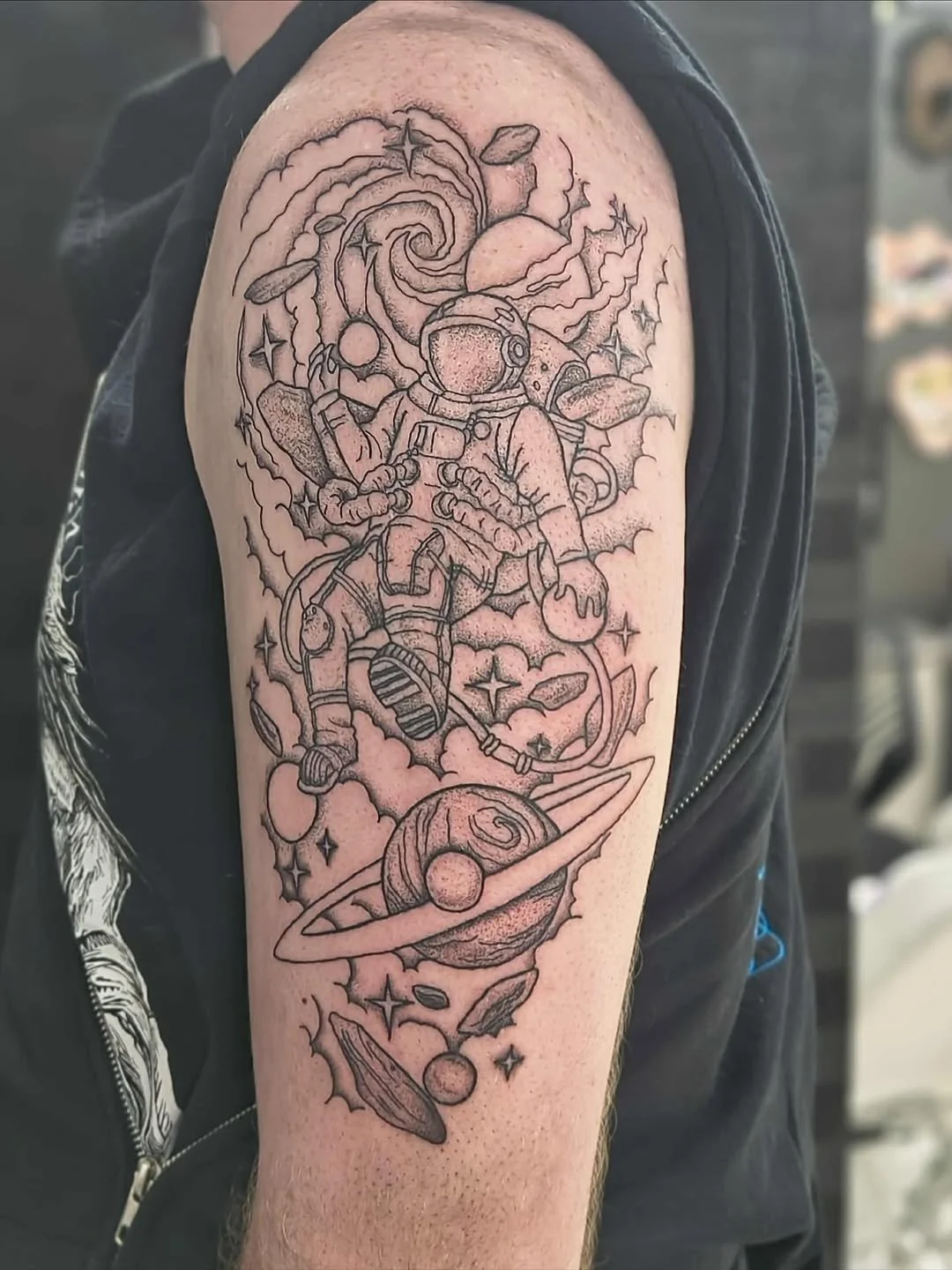 astronaut-space-planets-galaxy-upper-arm-sleeve-tattoo.jpg