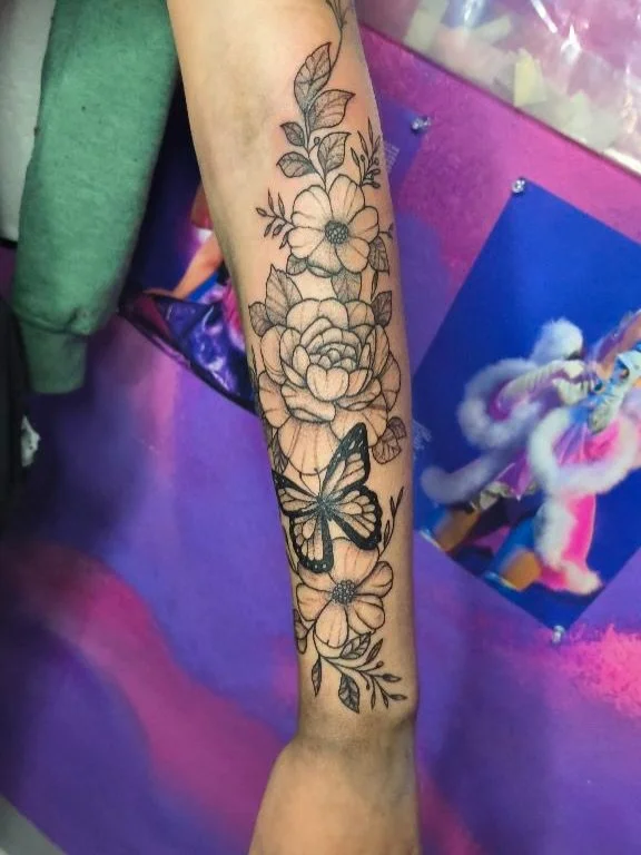 floral-bouquet-roses-butterfly-forearm-sleeve-tattoo.jpg