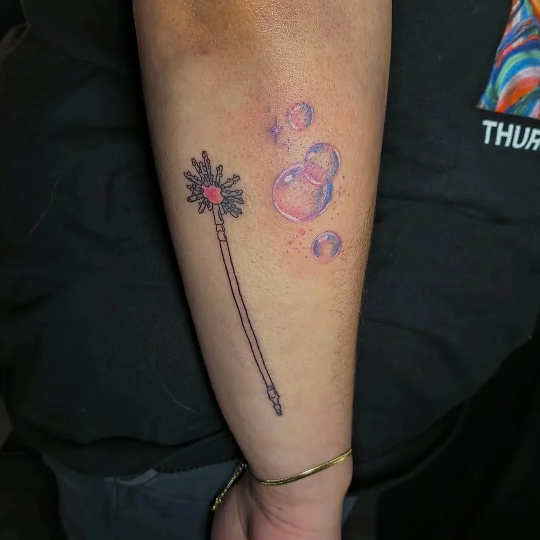 bubble-wand-colorful-soap-bubbles-whimsical-forearm-tattoo.jpg