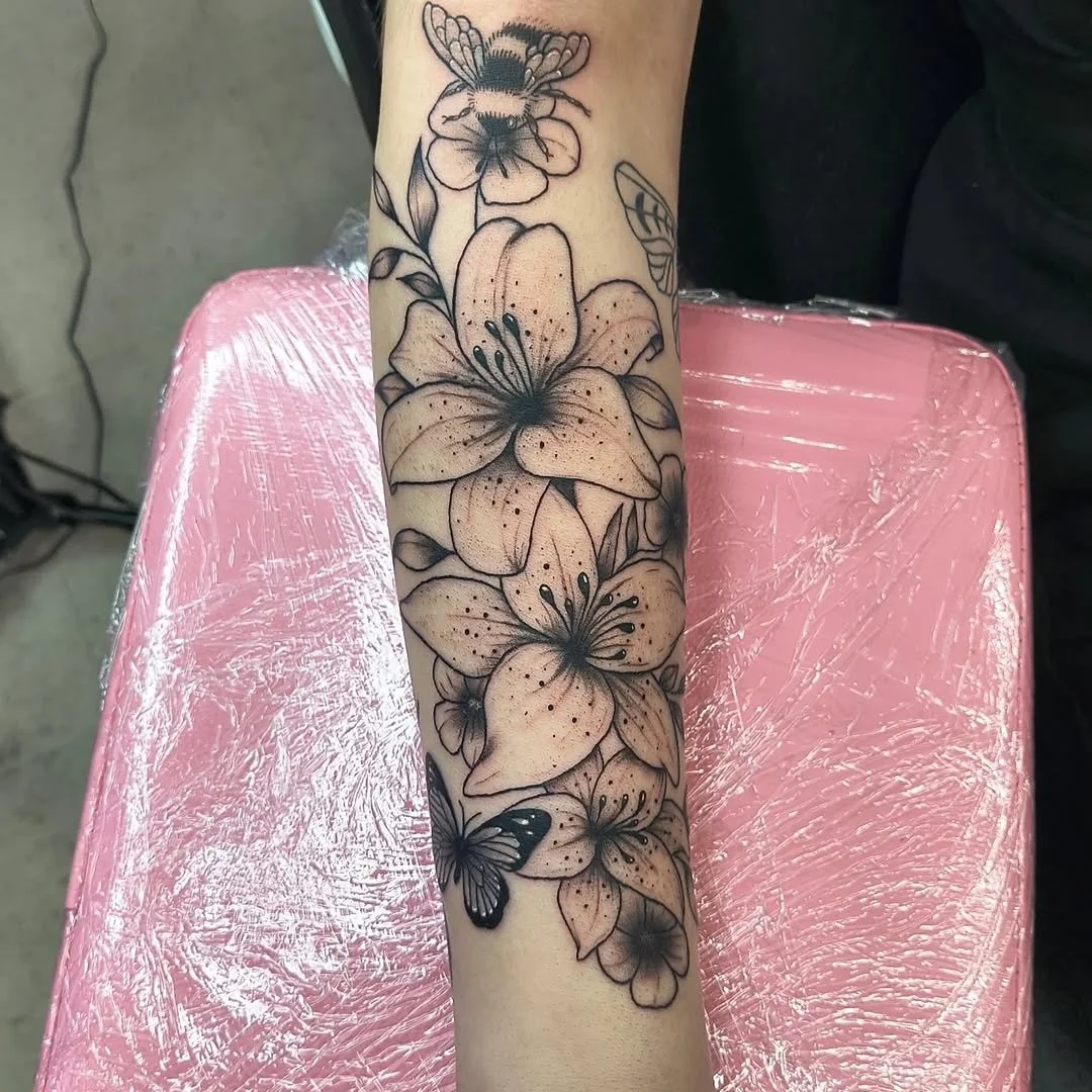 lily-flowers-bumblebee-butterfly-forearm-sleeve-tattoo.jpg
