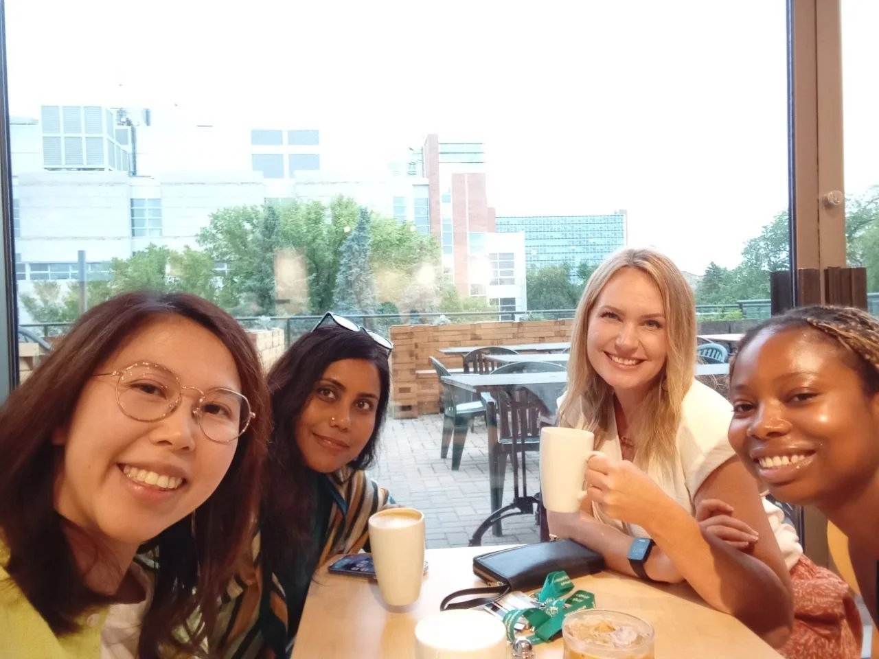 Group photo at Degrees Diner (August 2025) — Left to right: Clara Tam, Dr. Shahina Parvin, Dr. Mandy Archibald, Oluwatoyosi Fagbuyi