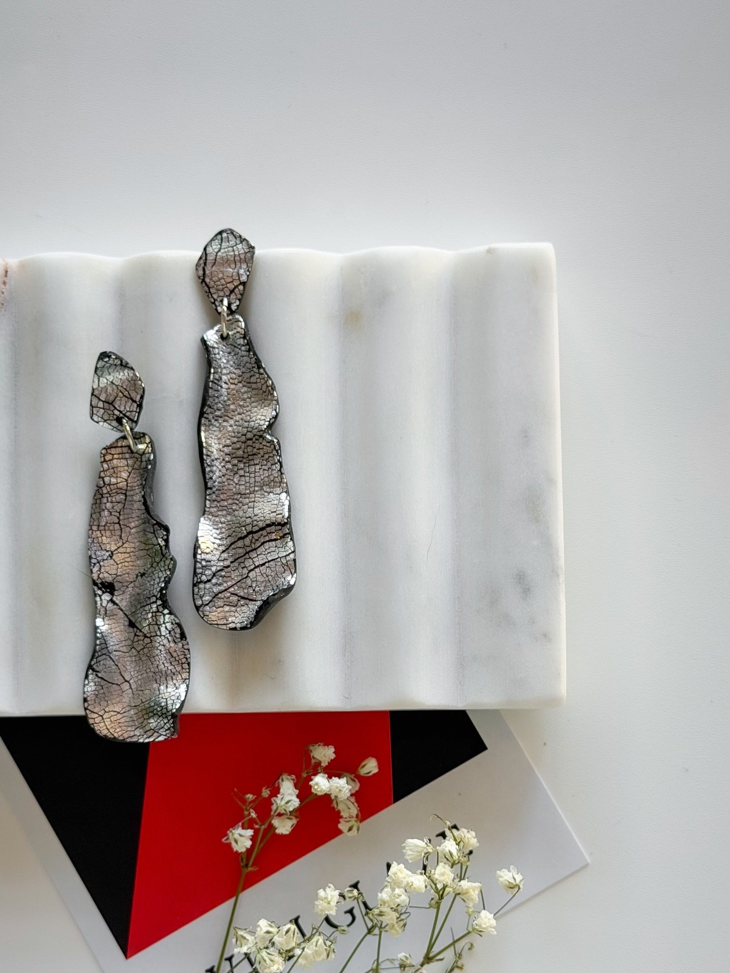 Meet Jolie, a fresh take on our beloved et&eacute;rea earrings.