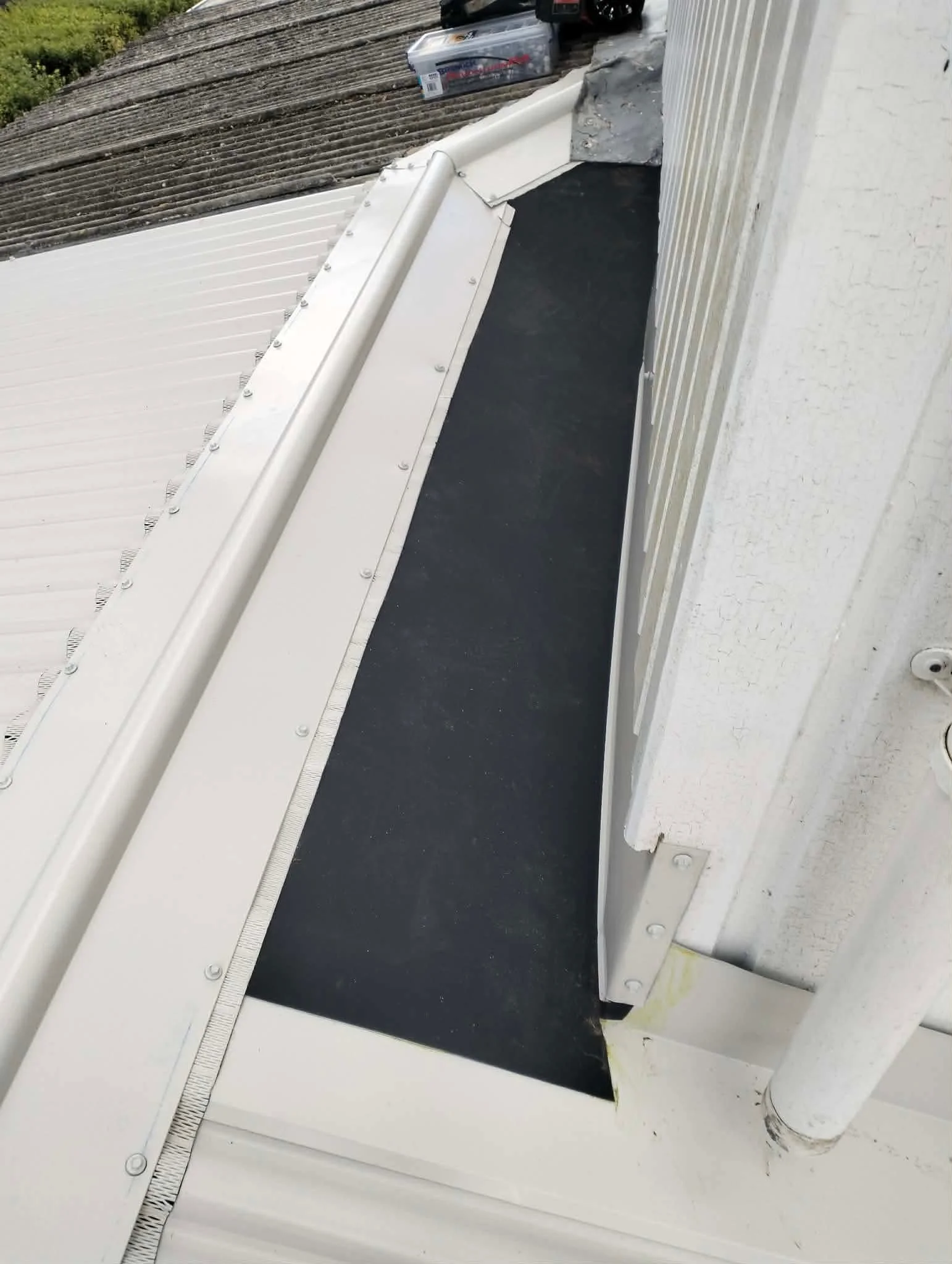 Small Re Roof in Titania with Butynol gutter